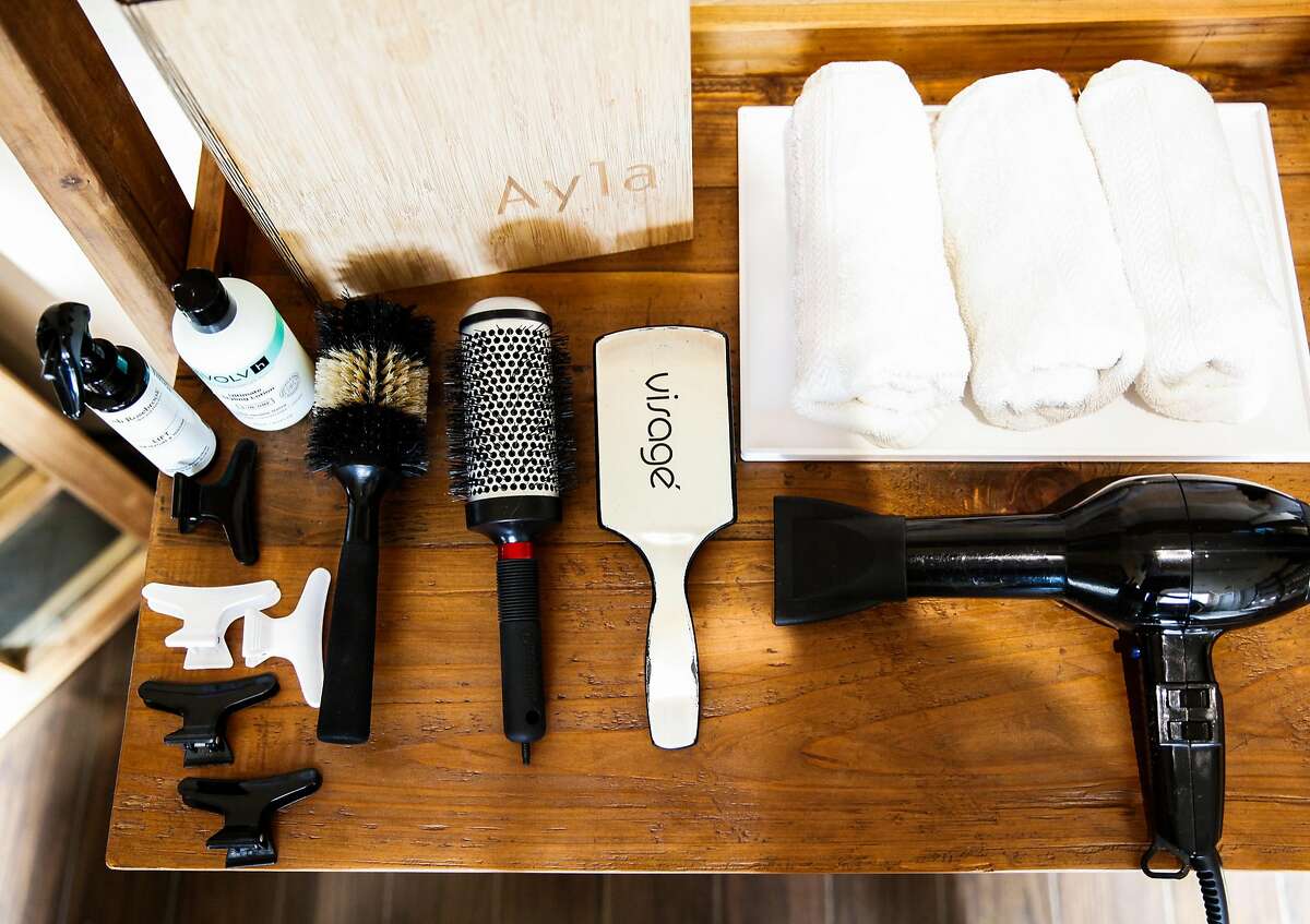 The items hairstylist Bradley Crane uses for a blowdry tutorial at Ayla in San Francisco, Calif., on Thursday, September 3, 2015.
