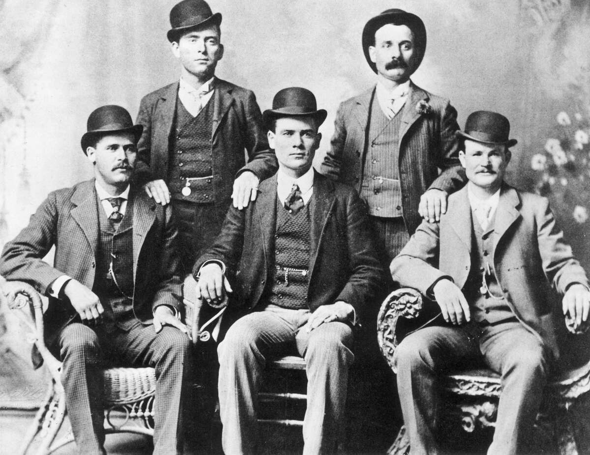 1885: Portrait of the American outlaw gang The Wild Bunch, Texas. From left to right, standing: William Carver, Harvey 'Kid Curry' Logan. Seated: Harry 'Sundance Kid' Langbaugh (1870 - 1909), Ben 'The Tall Texan' Kilpatrick, Robert LeRoy 'Butch Cassidy' Parker (1866 - 1909).