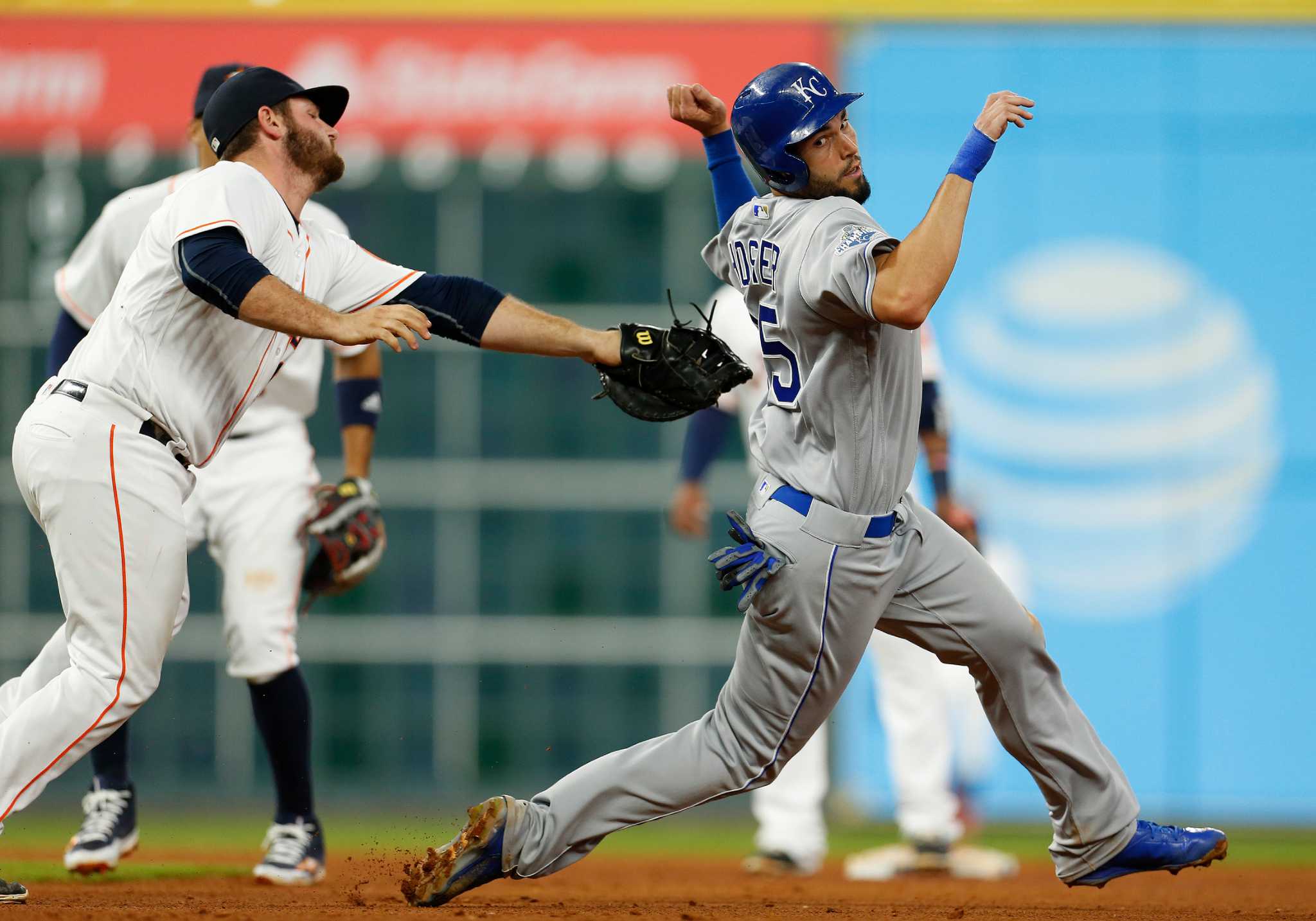 Kansas City Royals second baseman Omar Infante turns a double play