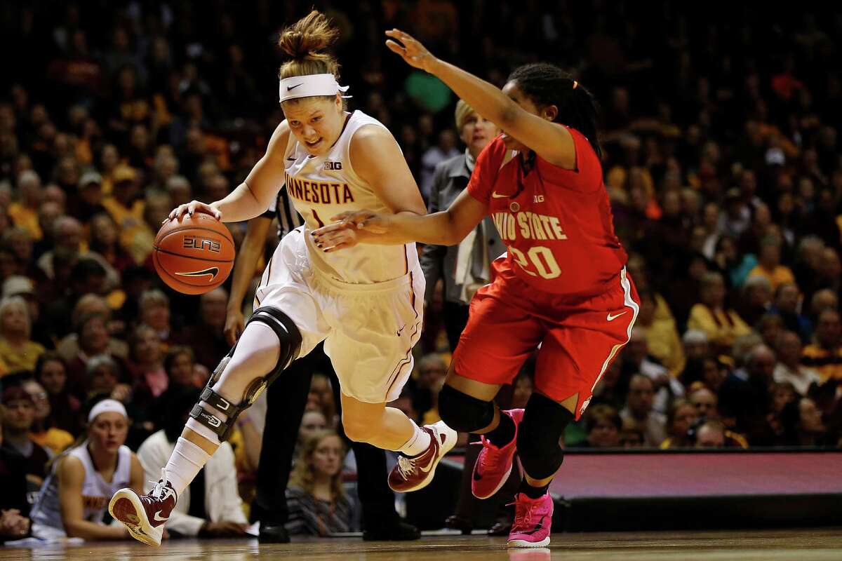 Minnesota guard Rachel Banham (1) drives the ball past Ohio State guard Asia Doss (20) in the second half of an NCAA college basketball game, in Minneapolis. Banham has earned a spot on The Associated Press All-America team and could be a target for the Stars in the draft.