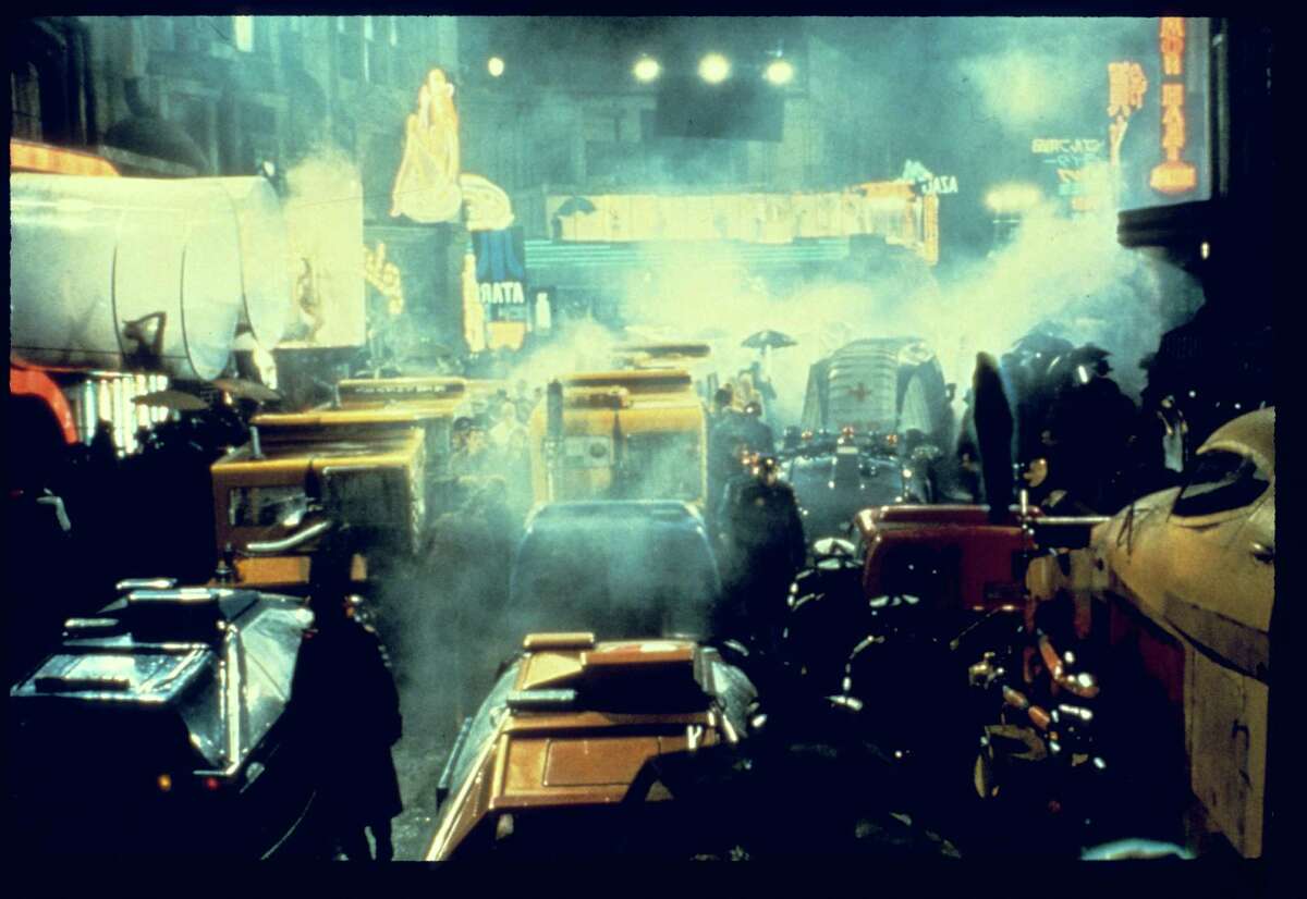 Blade Runner a Warner Bros. Film Starring Harrison Ford, directed by Ridley Scott 1982