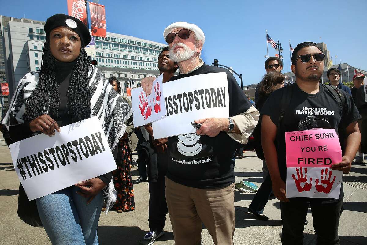 Protesters in front of city hall regarding the recent San Francisco Police Department's officer-involved shooting of Luis Gongora gather in San Francisco, California on wednesday, april 13, 2016.