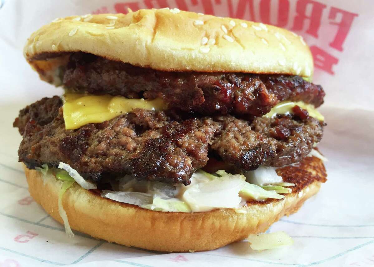 The Frontier Burger consists of two beef patties with cheese, lettuce, tomato, onions and Frontier special sauce.