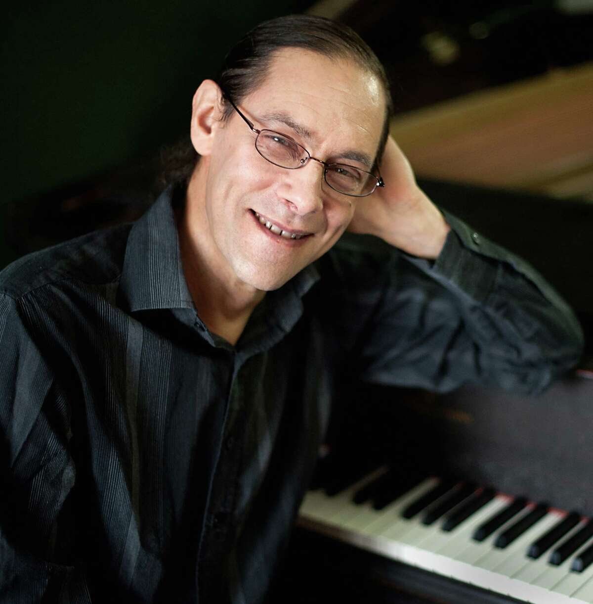 Bob Gluck's life as a conservatory student was blown wide open in 1970 when he first encountered "Bitches Brew," one of many landmark recordings by Miles Davis. Today, Gluck is more than just another avid fan. He's a pianist, composer and musicologist and has been on the faculty at the University at Albany since 2003. (Paul Grupp and Brenda Rose)