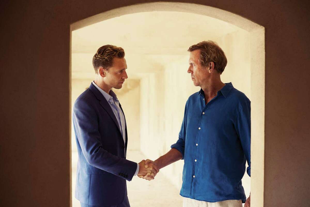 Jonathan Pine (Tom Hiddleston) befriends charming but morally corrupt chemical weapons dealer Richard Roper (Hugh Laurie) in an attempt to stop his globally threatening operations in AMC's adaptation of the John le Carré novel “The Night Manager.”