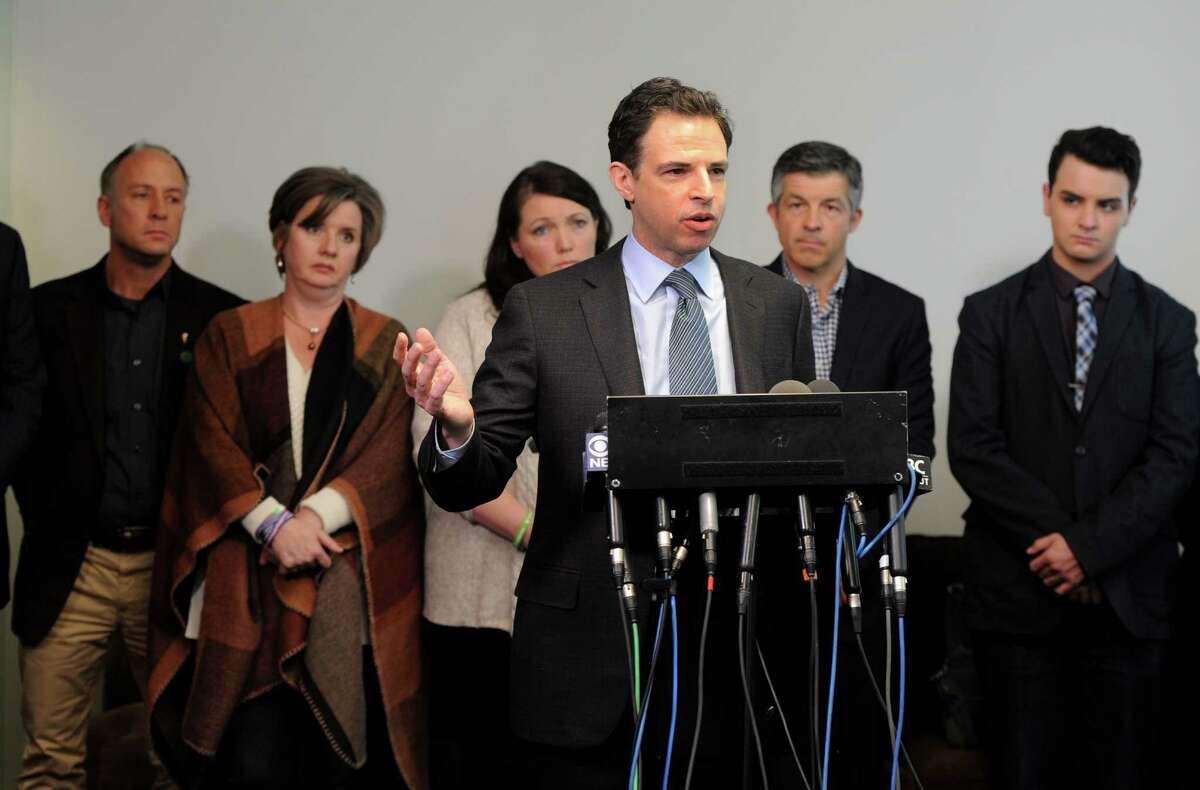 Attorney Joshua Koskoff and the Sandy Hook families that are suing the gun maker for providing the AR-15-type Bushmaster held a press conference at Koskoff, Koskoff & Bieder in Bridgeport, Conn. on Monday, Feb. 22, 2016. Superior Court Judge Barbara Bellis ruled Thursday that a lawsuit by the families of the Sandy Hook Elementary School victims could proceed against the manufacturer of the military-style rifle used to kill the 20 first graders and six adults in December, 2012.