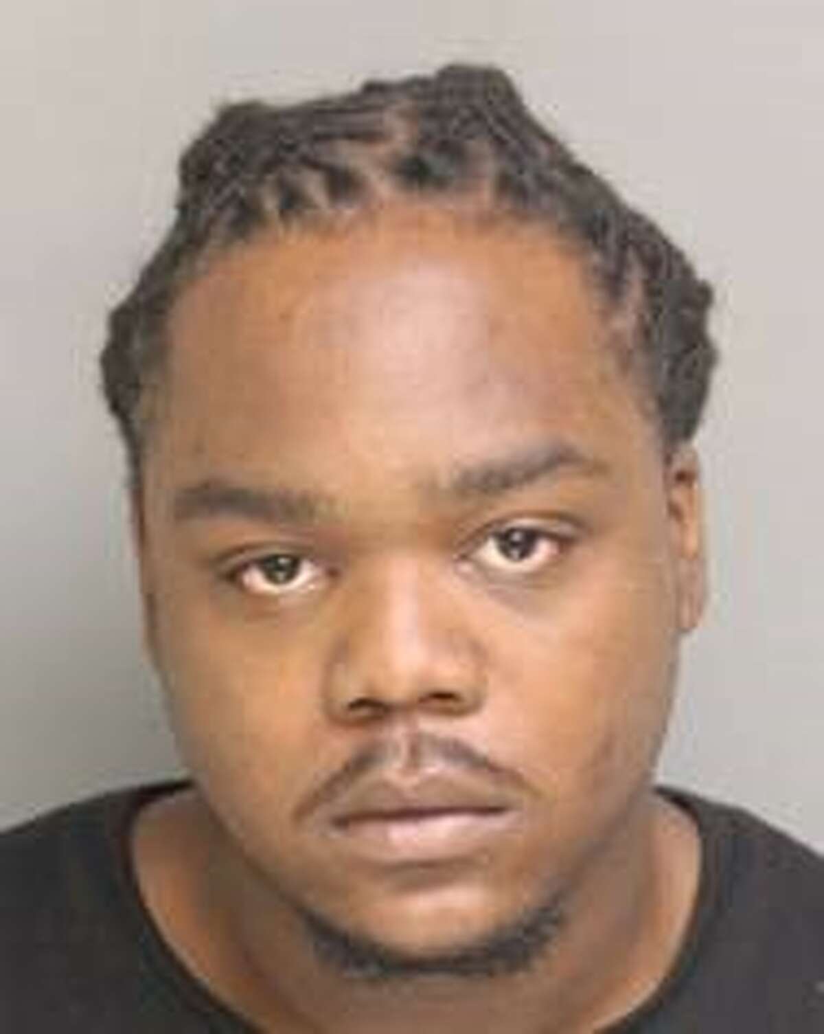 Police: Warrant raid yields gun, drugs
