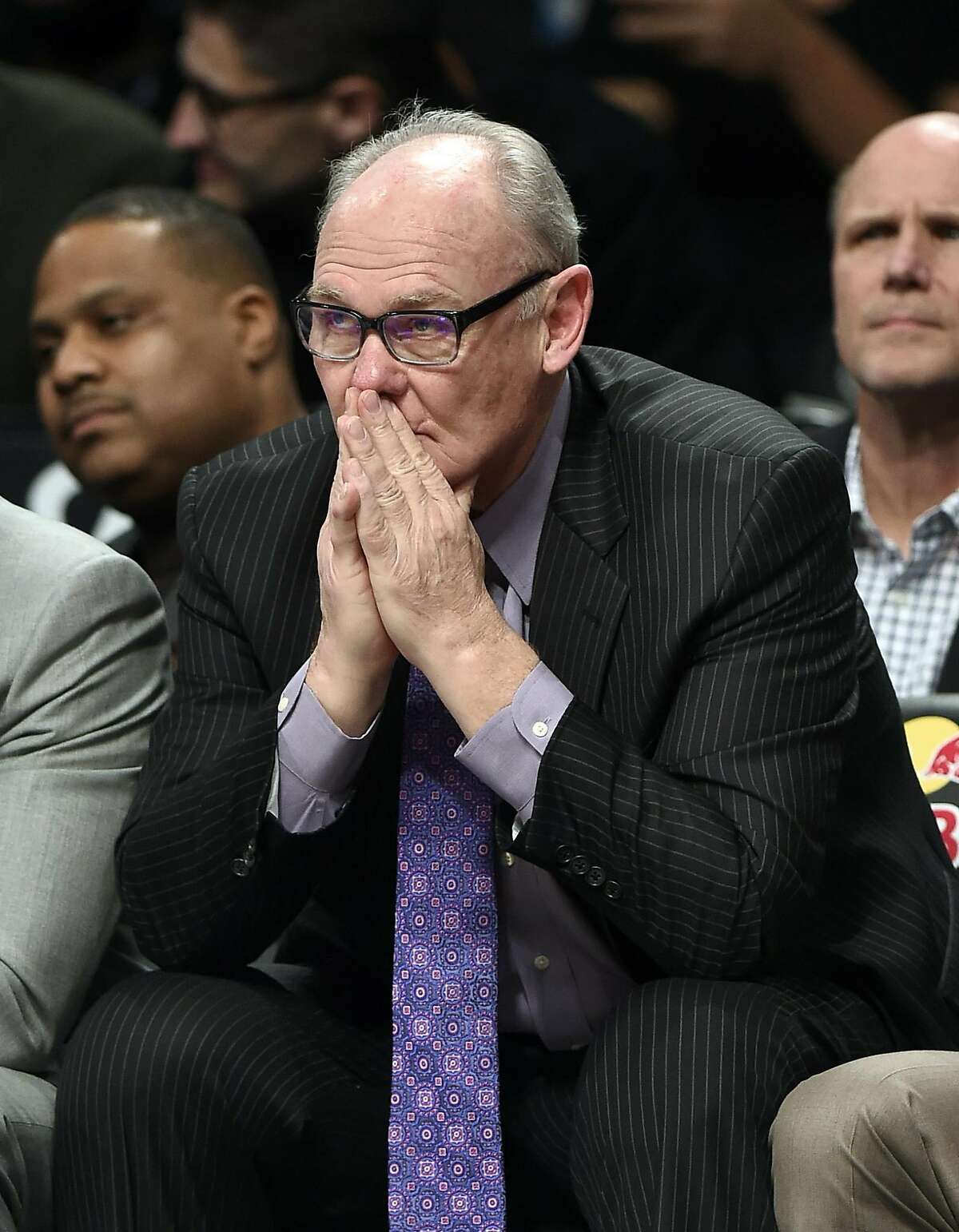 FILE - In this Feb. 5, 2016 file photo, Sacramento Kings coach George Karl reacts to his team's play during the second half of an NBA basketball game against the Brooklyn Nets, in New York. The Sacramento Kings have fired coach George Karl after his first full season with the team, setting the stage for the team to hire its ninth coach since last making the playoffs in 2006. General manager Vlade Divac announced the move Thursday, April 14, 2016, a day after the Kings wrapped up another disappointing season with a 33-49 record. (AP Photo/Kathy Kmonicek, File)