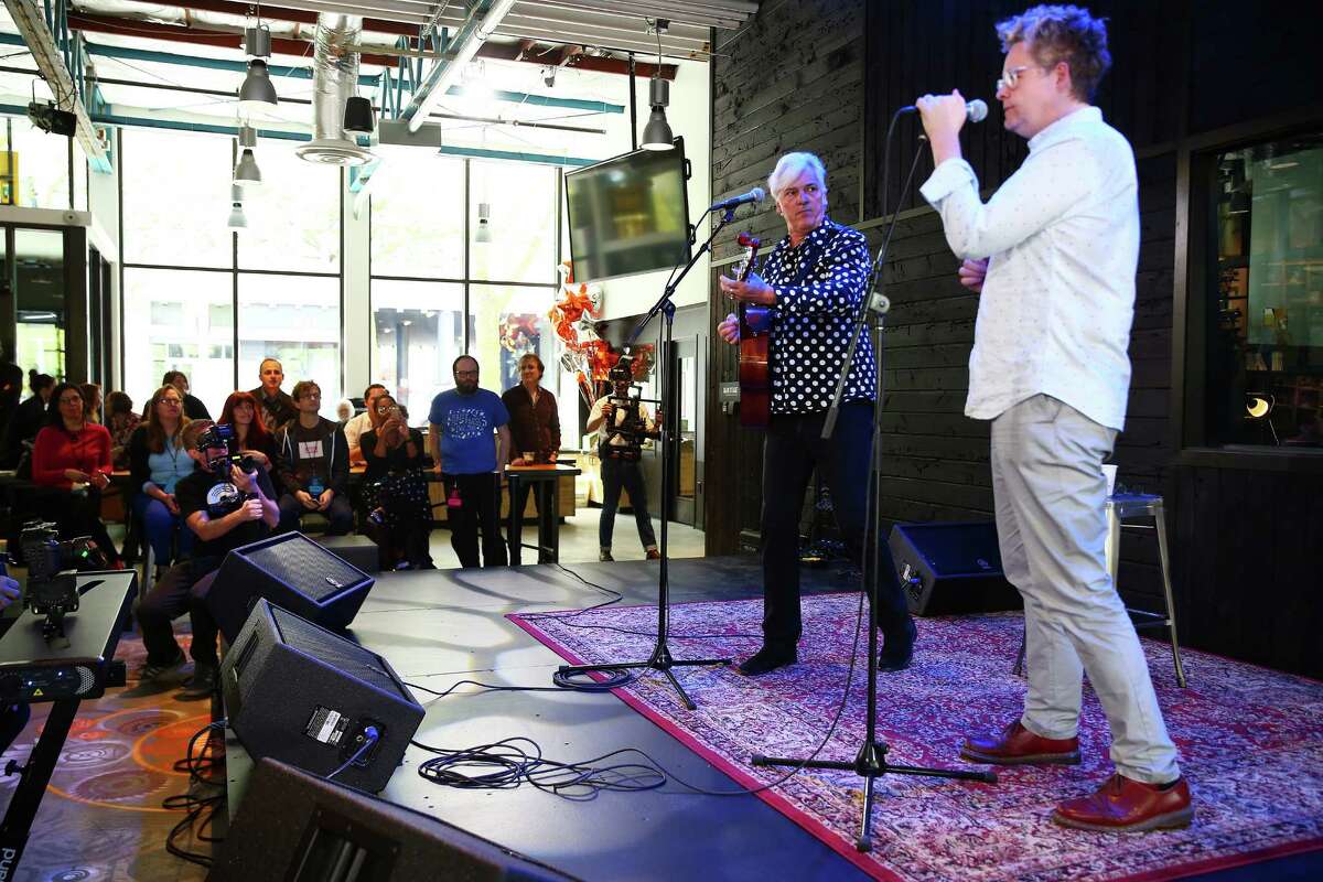 Musicians Robyn Hitchcock and Sean Nelson perform during a pre-opening day event at the new KEXP studio at Seattle Center, Thursday, April 14, 2016. The studio's public grand opening will be held Saturday, April 16.