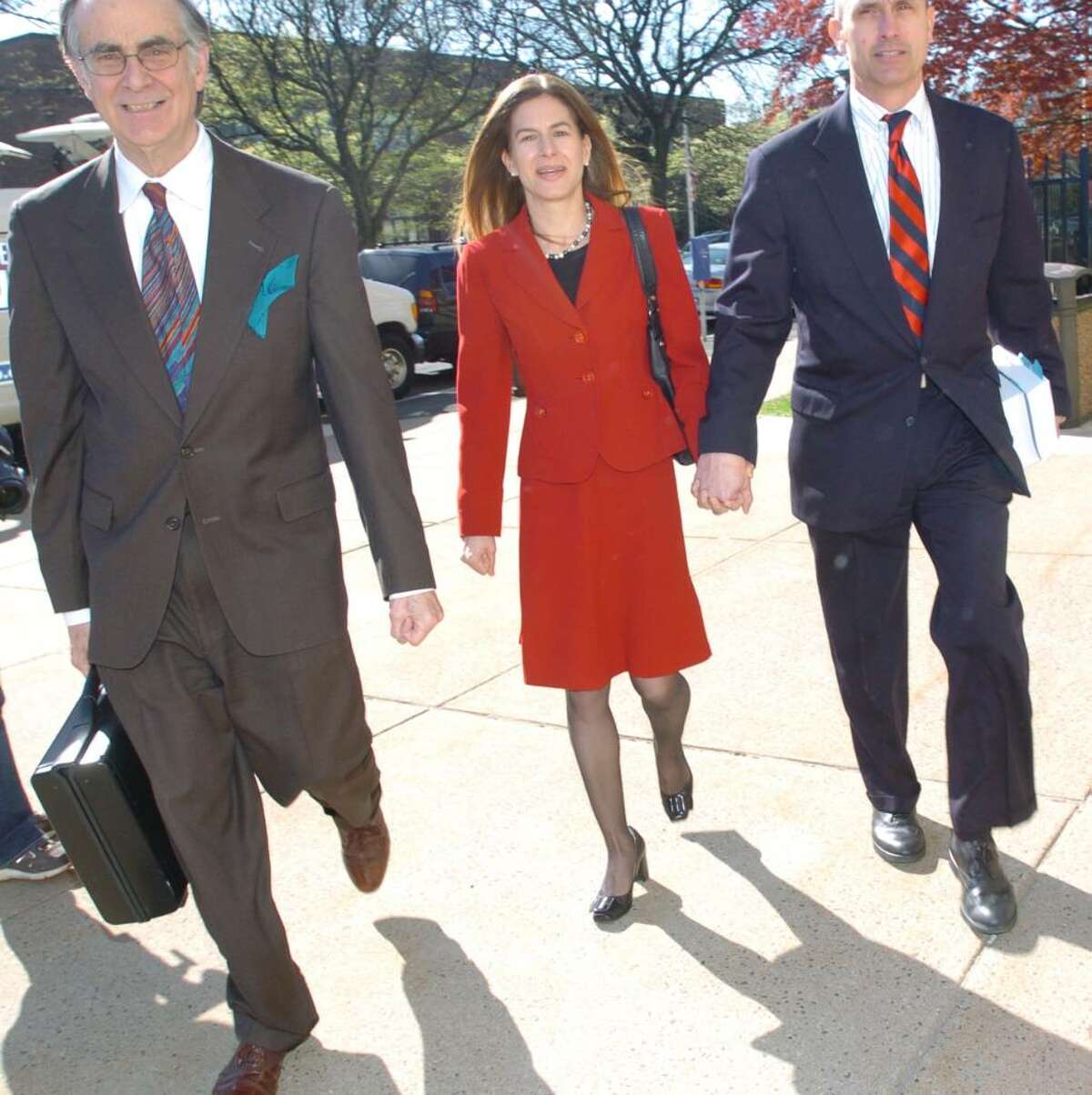 Secretary of the State Susan Bysiewicz, center, walks into Hartford Superior Court Wednesday, April, 14, 2010.