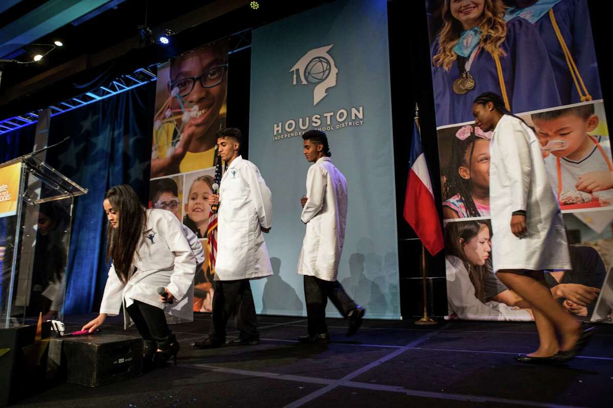 Students from the Jane Long Academy help open the Houston Independent School District's State of The Schools event March 3 in Houston. ( Brett Coomer / Houston Chronicle )