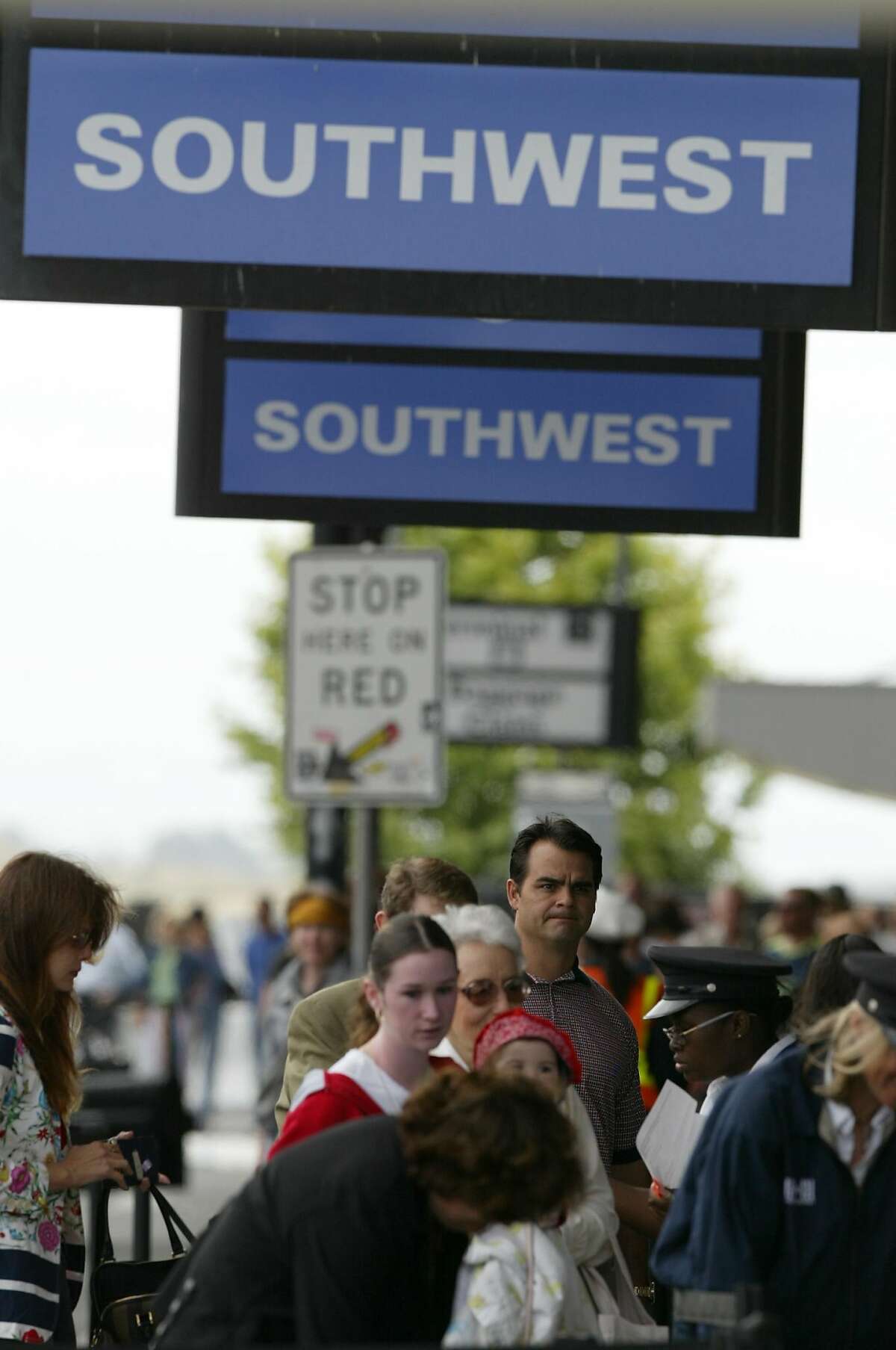 The SouthWest airline expansion of Terminal Two at the Oakland Airport. SOUTHWEST-kr008.JPG 6/4/04 in Oakland,CA. Kurt Rogers/The Chronicle Southwest Airlines has become so popular at Oakland International Airport, above, that the airport is remodeling and expanding Terminal 2, left, to accommodate the successful low-cost carrier that accounts for 60 percent of its flights and passengers.