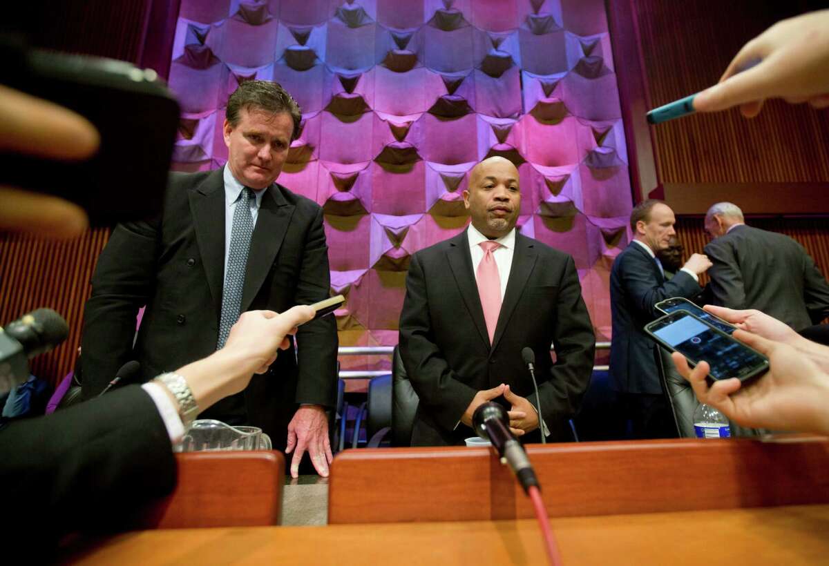 Senate Majority Leader John Flanagan, R-Smithtown, left, and Assembly Speaker Carl Heastie, D-Bronx, talk with media members after a general conference committee meeting on the budget on Wednesday, March 23, 2016, in Albany, N.Y. (AP Photo/Mike Groll)
