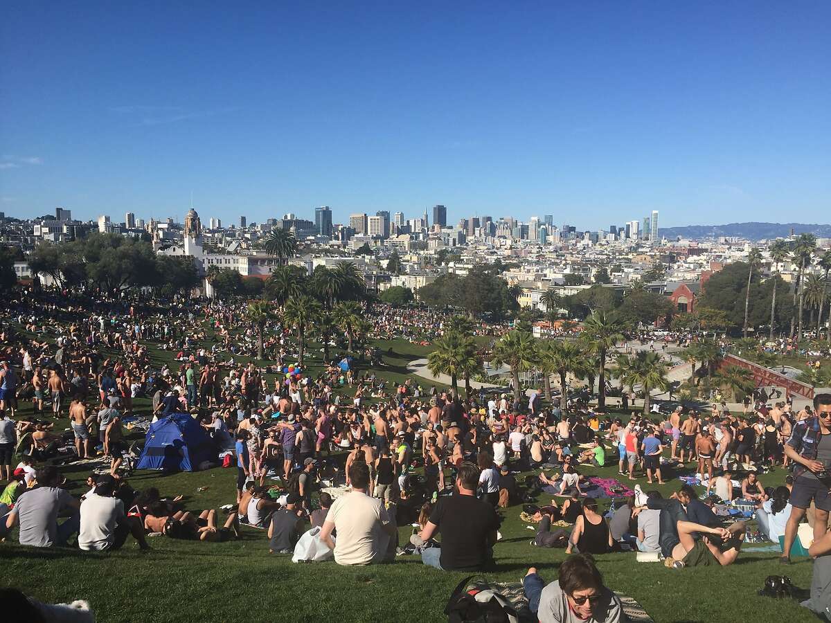 The weekend's warm weather brought out the large crowds lounging at Dolores Park on Saturday, April 16, 2016.