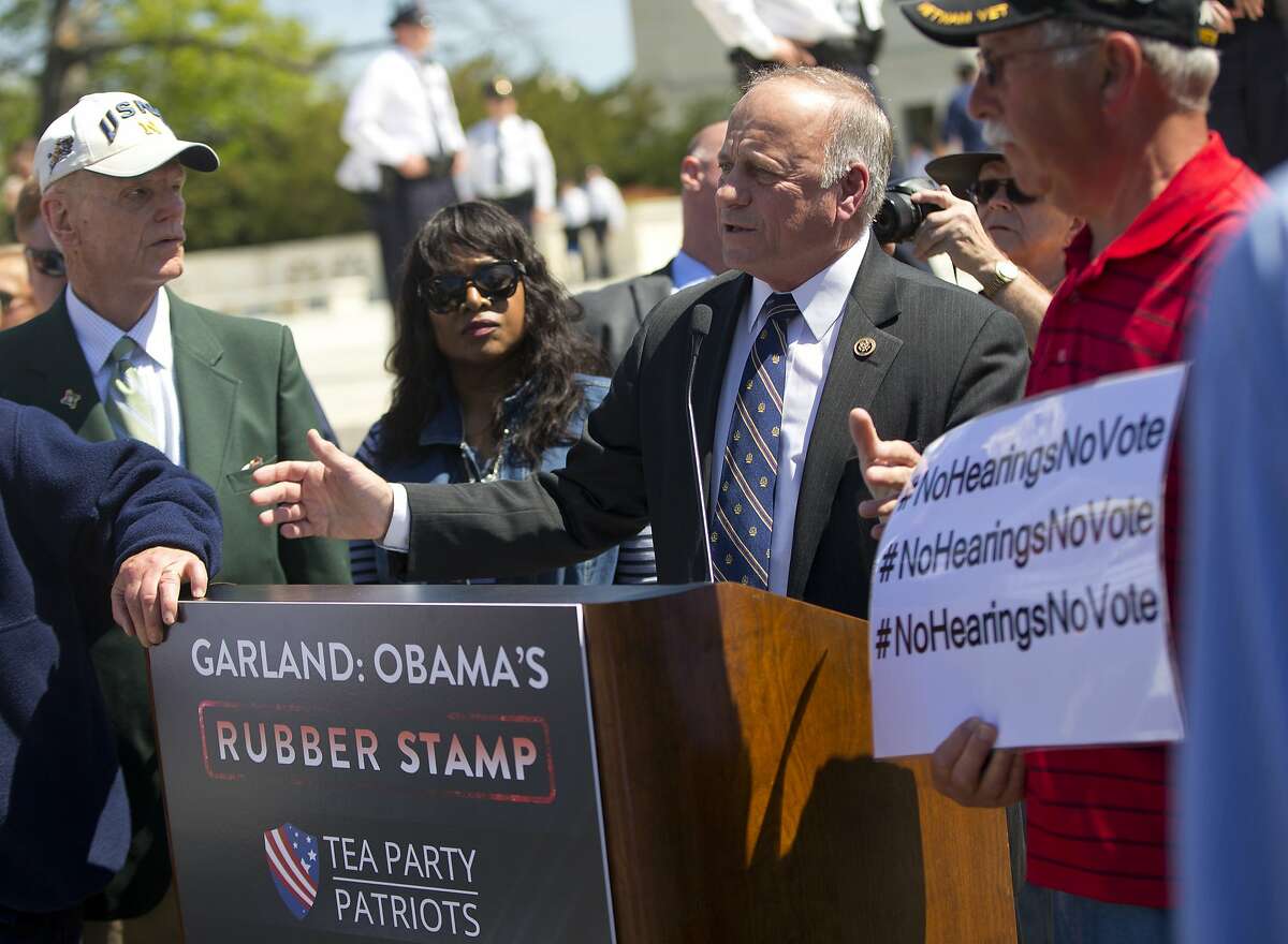 Rep. Steve King, R-Iowa, speaks to a small group of demonstrators opposing President Obama's immigration reform, outside the Supreme Court in Washington, Monday, April 18, 2016. The Supreme Court is taking up an important dispute over immigration that could affect millions of people who are living in the country illegally. The Obama administration is asking the justices in arguments today to allow it to put in place two programs that could shield roughly 4 million people from deportation and make them eligible to work in the United States.