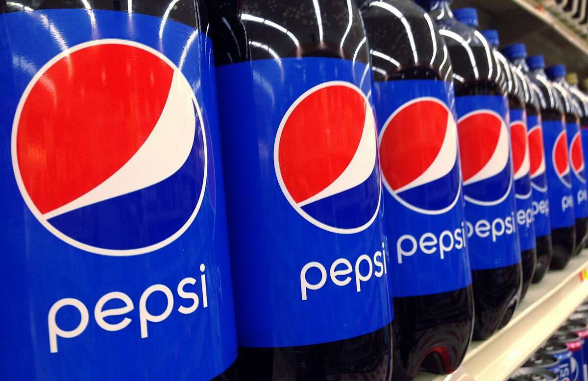 FILE - In this July 9, 2015, file photo, Pepsi bottles are on display at a supermarket in Haverhill, Mass. PepsiCo reports financial results on Monday, April 18, 2016. (AP Photo/Elise Amendola, File)