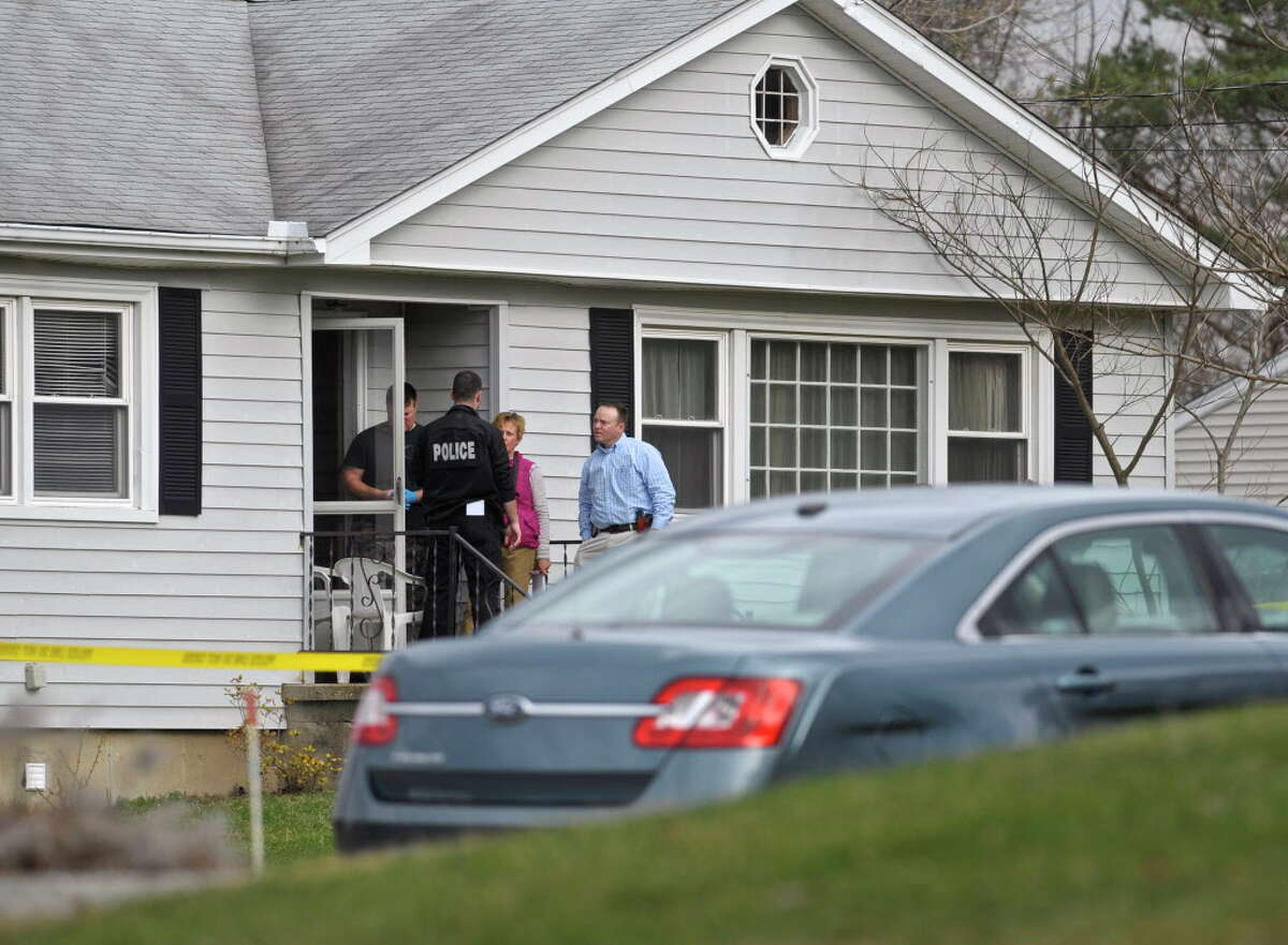 Bethel Police investigate at the site of a shooting on Governors Lane, in Bethel, Friday afternoon. One person was dead and two others were taken to the hospital following the shooting according to Bethel Police Chief Jeff Finch. March 25, 2016, in Bethel, Conn.
