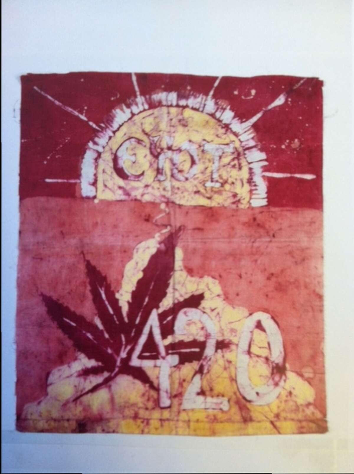 The 420 flag, pictured here, was made by a friend of the Waldos named Patty Young in the 1970s. The phrase "EYOT" at the top was mostly meaningless, but it became used as a substitute for 'It’s all too weird and funny!'"