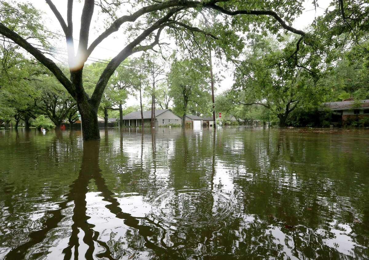 Flooding along Runnymeade Drive, in the Meyerland area, is seen Monday, April 18.