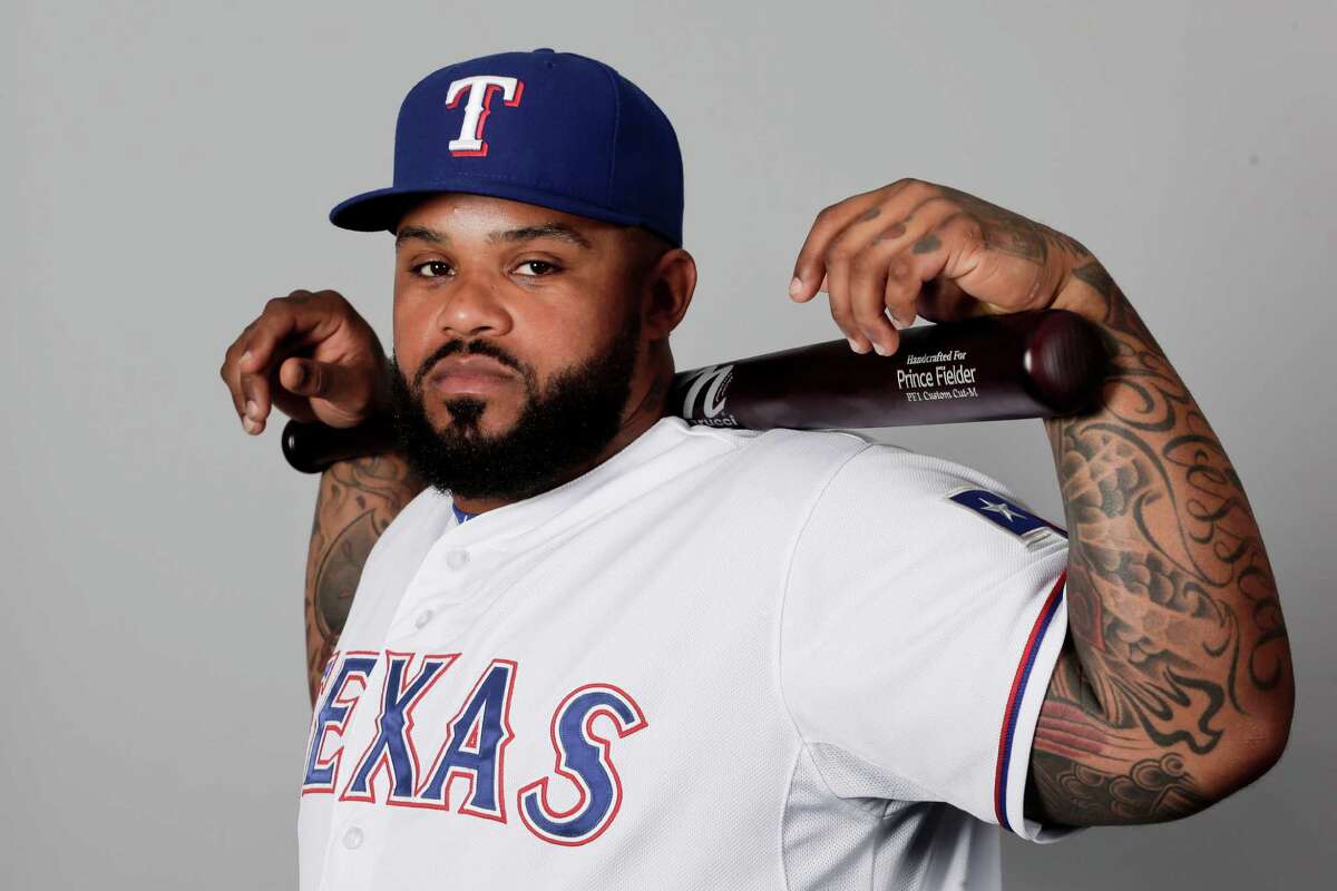 FILE - This is a 2016 file photo showing Prince Fielder of the Texas Rangers baseball team. Rangers slugger Prince Fielder has been sent back to Texas to take part in a sleep study after having trouble getting rest during spring training. The team said Fielder returned to Texas on Wednesday, March 9, 2016. (AP Photo/Charlie Riedel, File)