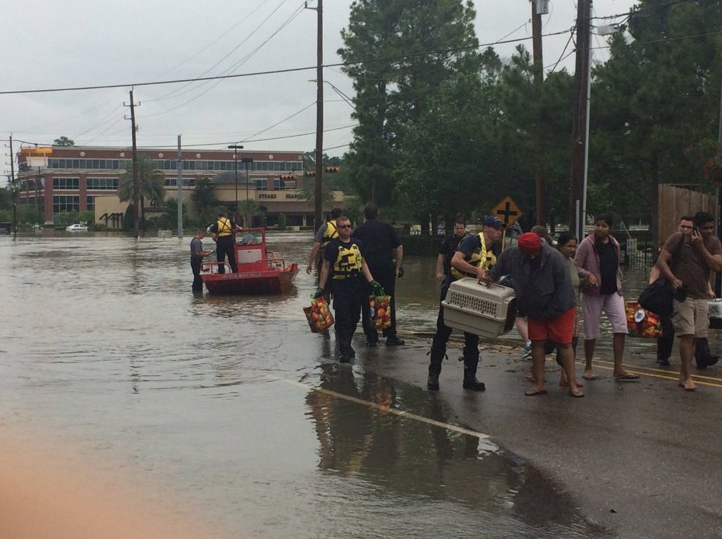 As rescues continue officials eye recovery from flood