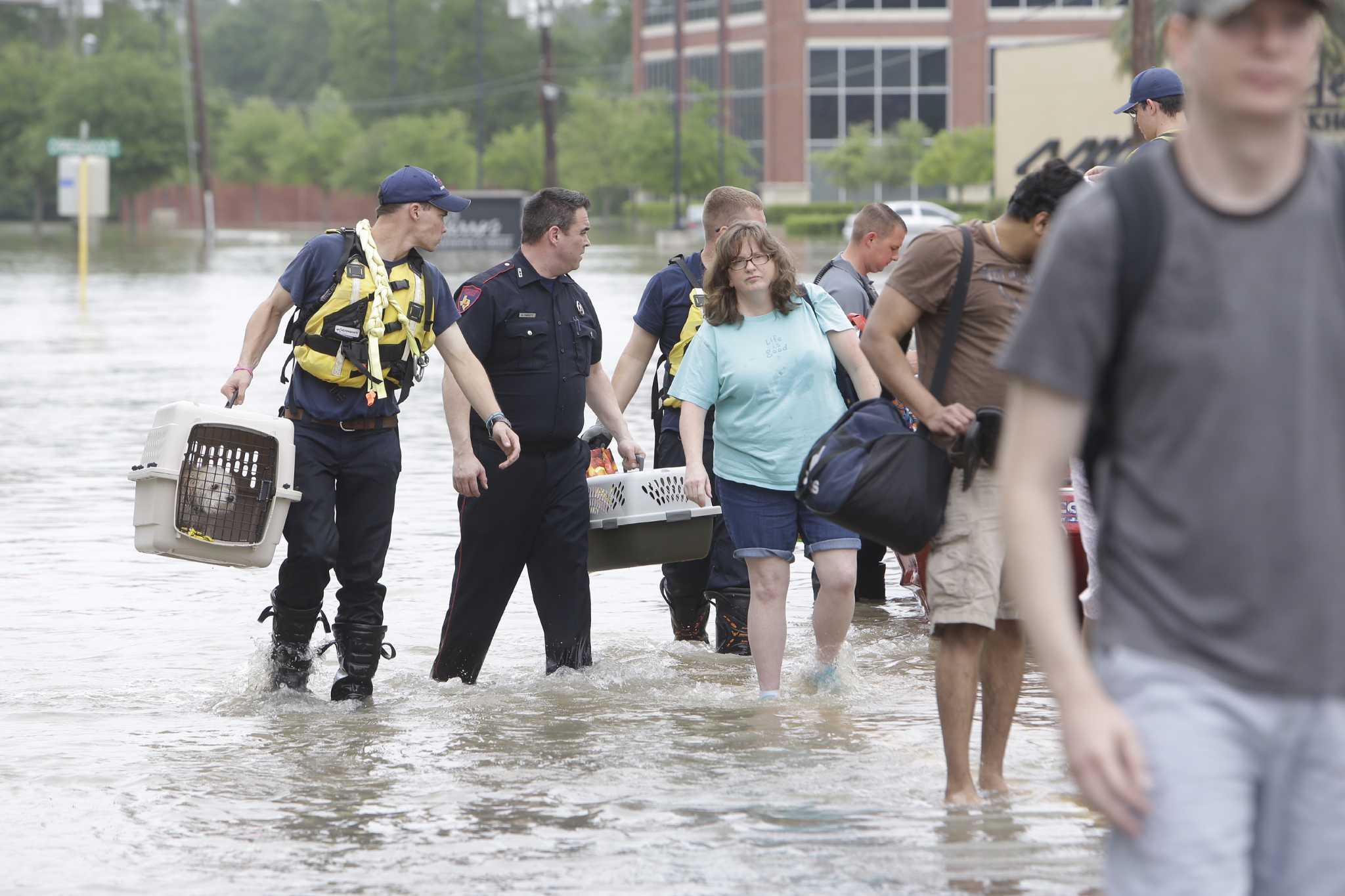 As rescues continue officials eye recovery from flood