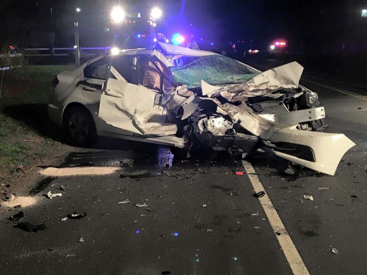 This picture, taken by an unknown person and provided by Newtown Police Department, shows what was left of the Honda Civic that was struck by a pickup truck on South Main Street Sunday night, killing its 90-year-old driver.