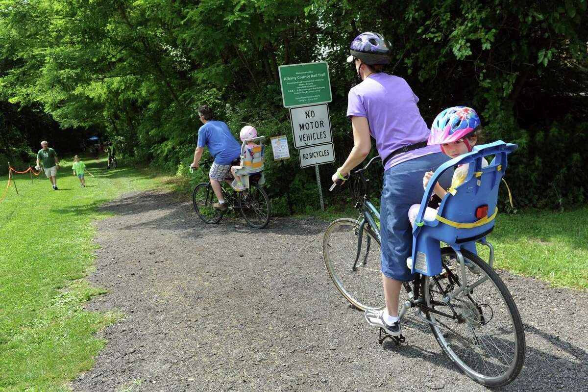 A family bikes along a nearly complete portion of the Albany County Helderberg Hudson Rail Trail during the 4th annual Summer Solstice Festival on Saturday, June 20, 2015, in Delmar, N.Y. (Cindy Schultz / Times Union)