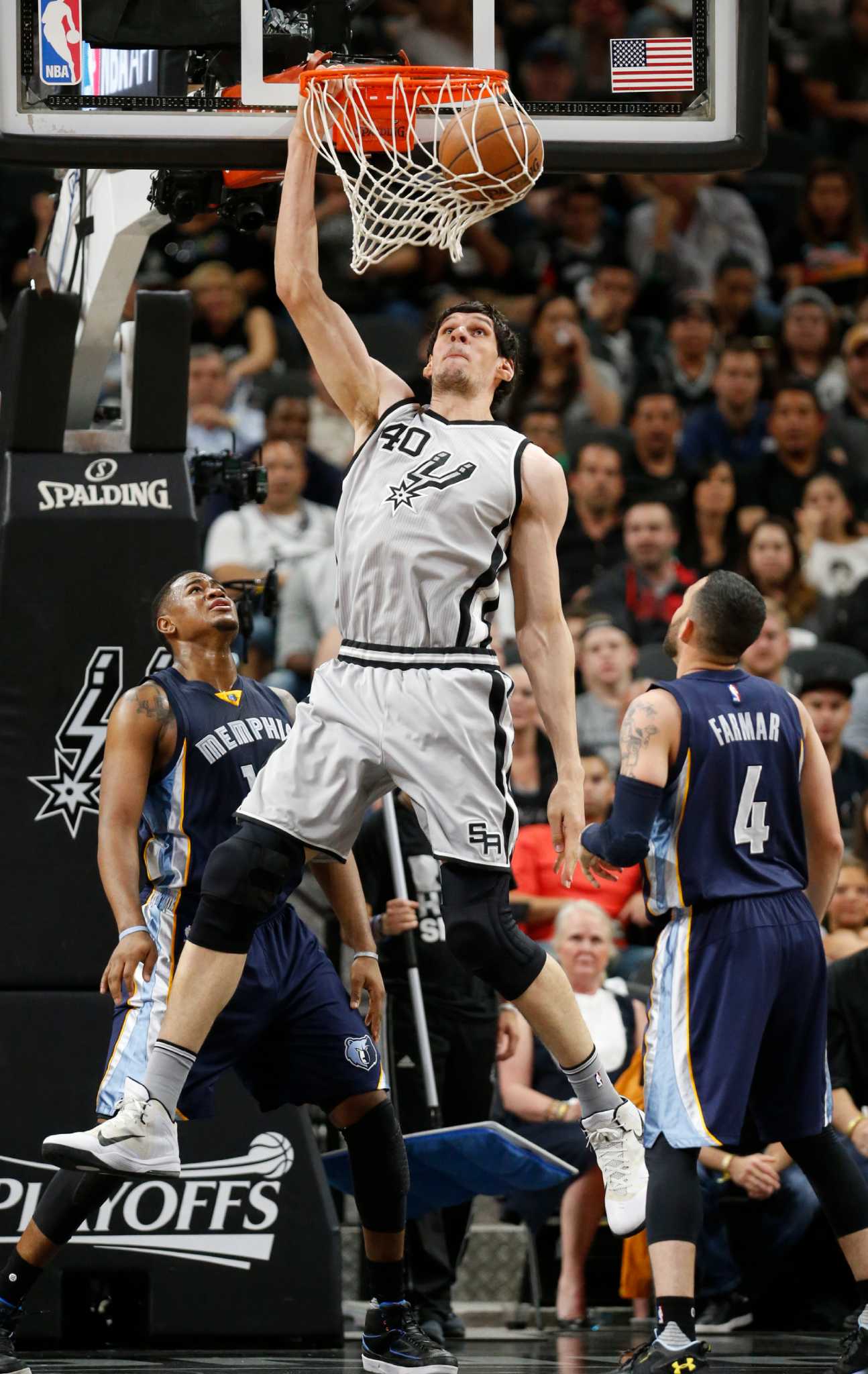 Dallas Mavericks' Boban Marjanovic shakes hands with a fan prior