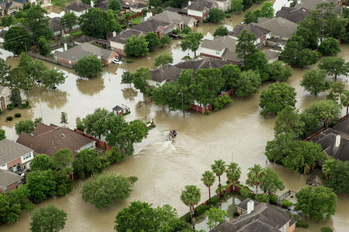 Katy midwife rides an inflatable white swan to help birth a baby