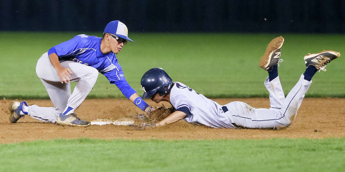 Clemens' J.J. Esquivel tags out Smithson Valley's Mason Minister at second base during the fifth inning Tuesday night.