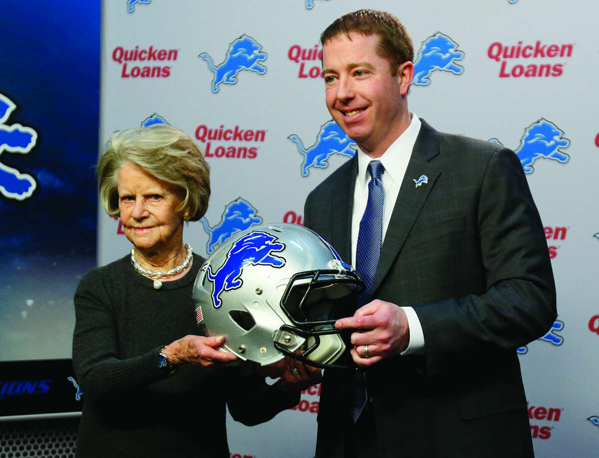 Detroit Lions owner Martha Firestone Ford, left, poses with their new general manager Bob Quinn, right, during a news conference Monday, Jan. 11, 2016, in Allen Park, Mich. (AP Photo/Duane Burleson)