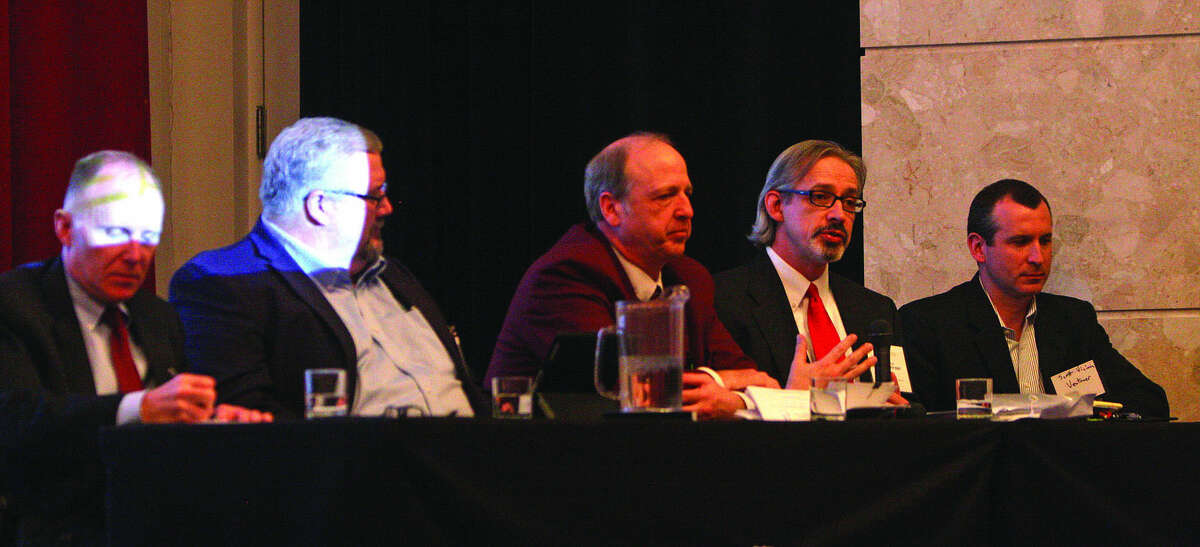 Carl Osentoski, executive director of Huron County Economic Development Corp., second from right, speaks to about 100 people during a “Huron County Case Study” at a state wind forum at Michigan State University on Tuesday. Other panelists, from left, are Matt Wagner of DTE Energy, David Shiflett of Geronimo Energy, County Commissioner David Peruski and Scott Viciana of Ventower.