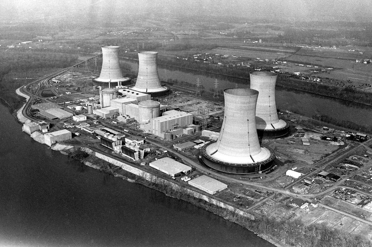 FILE - This March 30, 1979, file photo shows an aerial view of the Three Mile Island nuclear power plant near Harrisburg, Pa. The small dome at center is where the "incident" occured. A presidential commission later said the TMI accident was "the result of a series of human, institutional and mechanical failures'' that had implications throughout the U.S. nuclear industry as it operated at that time. (AP Photo/Barry Thumma, File)