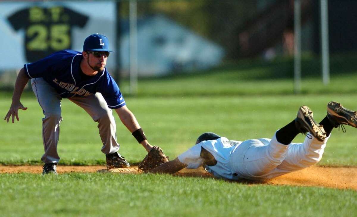 Fairfield Ludlowe's Zach Garoffolo tags out Trumbull's Anthony Matera in the fifth inning of Wednesday's game Apr. 14, 2010 at Trumbull.