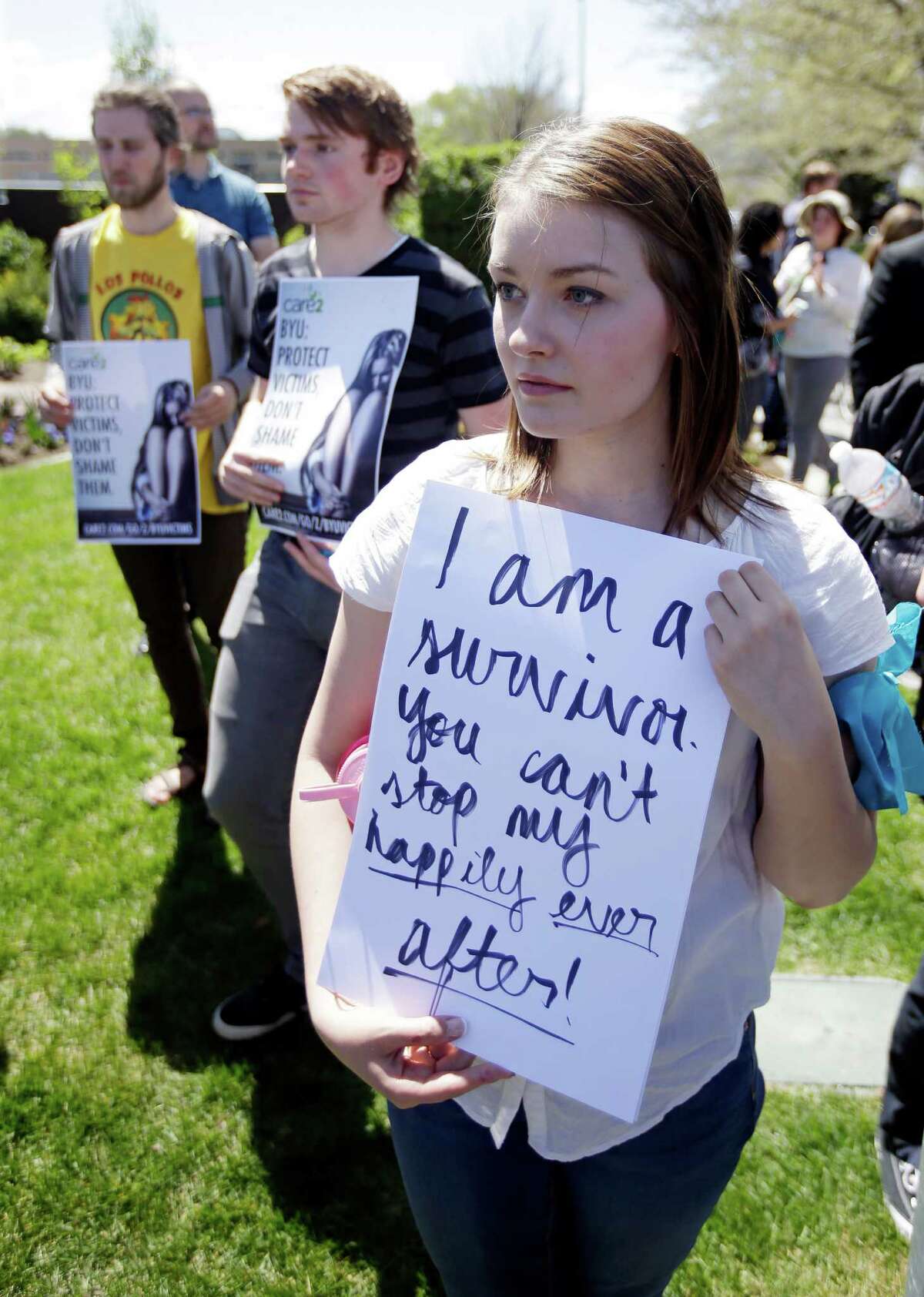 Katie Townsley and other demonstrators ﻿at Brigham Young University on Wednesday say school policy discourages women from reporting sexual violence.