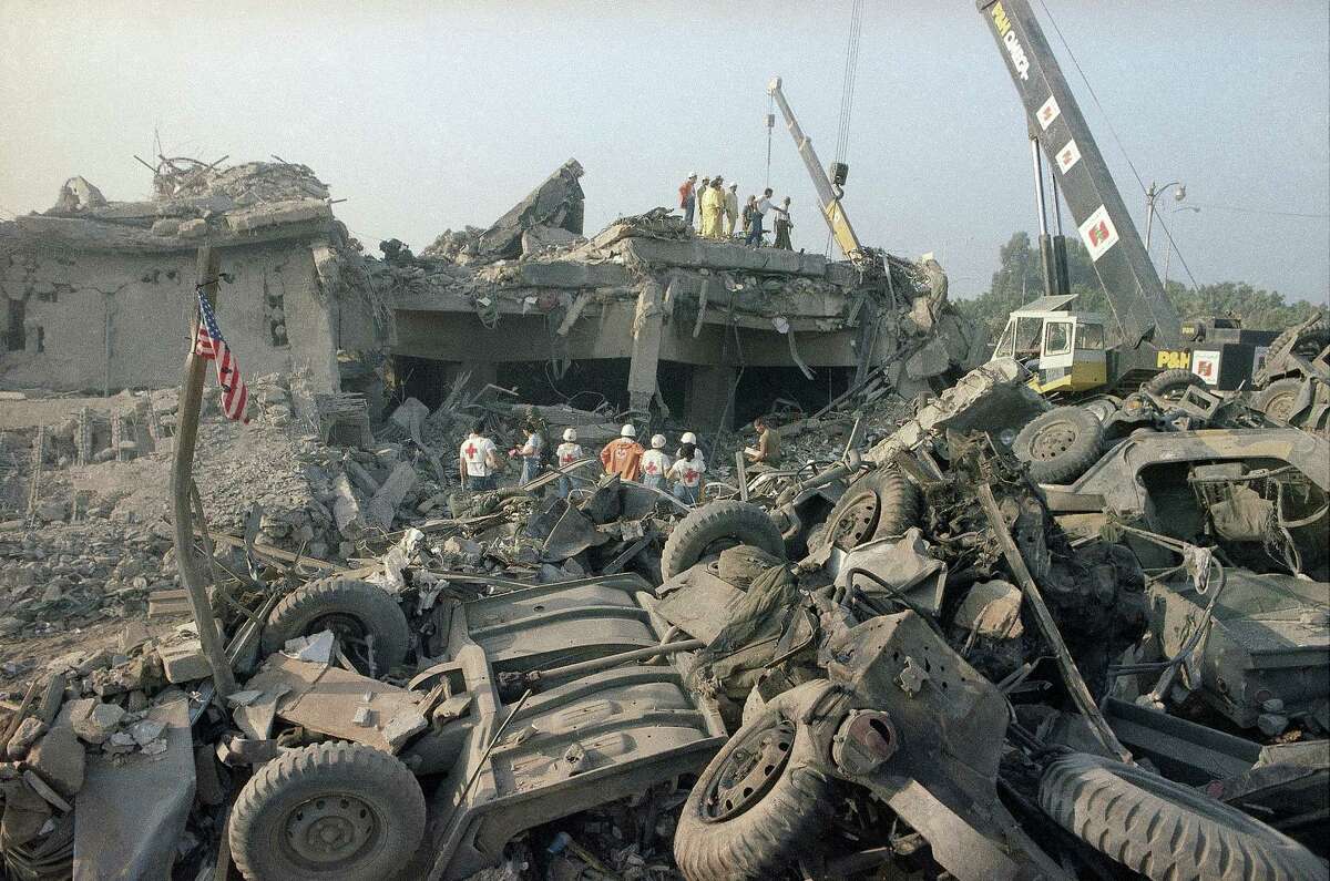FILE - In this Oct. 23, 1983 file photo, the aftermath of the bombing of the U.S. Marines barracks in Beirut, Lebanon. The Supreme Court upheld a judgment allowing families of victims of Iranian-sponsored terrorism to collect nearly $2 billion. The court on Wednesday, April 20, 2016, ruled 6-2 in favor of relatives of the 241 Marines who died in a 1983 terrorist attack in Beirut and victims of other attacks that courts have linked to Iran.(AP Photo/Jim Bourdier, File)