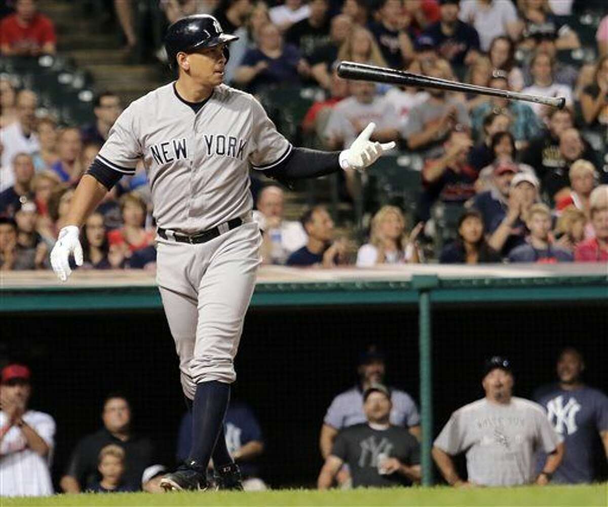 FILE - In this Aug. 13, 2015, file photo, New York Yankees Alex Rodriguez flips his bat after striking out in the eighth inning of a baseball game against the Cleveland Indians in Cleveland. Rodriguez says he plans to retire from baseball after the 2017 season. The Yankees slugger revealed his intentions Wednesday, March 23, 2016, during an interview with ESPN. His plans were confirmed by spokesman Ron Berkowitz. (AP Photo/Aaron Josefczyk, File)