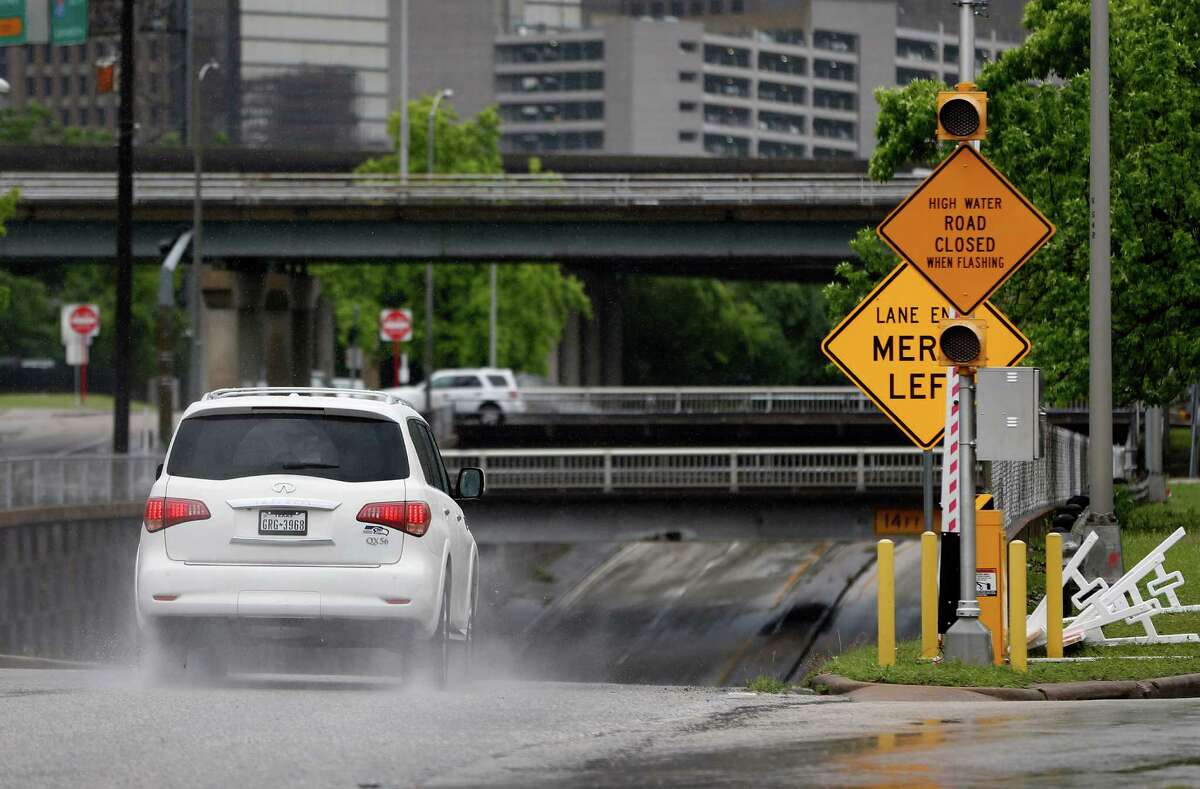 After last year's deadly Memorial Day floods, city officials identified 27 flood-prone locations where a gate, similar to one shown Wednesday at the Houston Avenue underpass at Memorial, will be installed.﻿