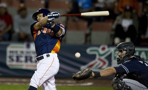 Correa leads Astros over Padres 11-1 in Mexico City