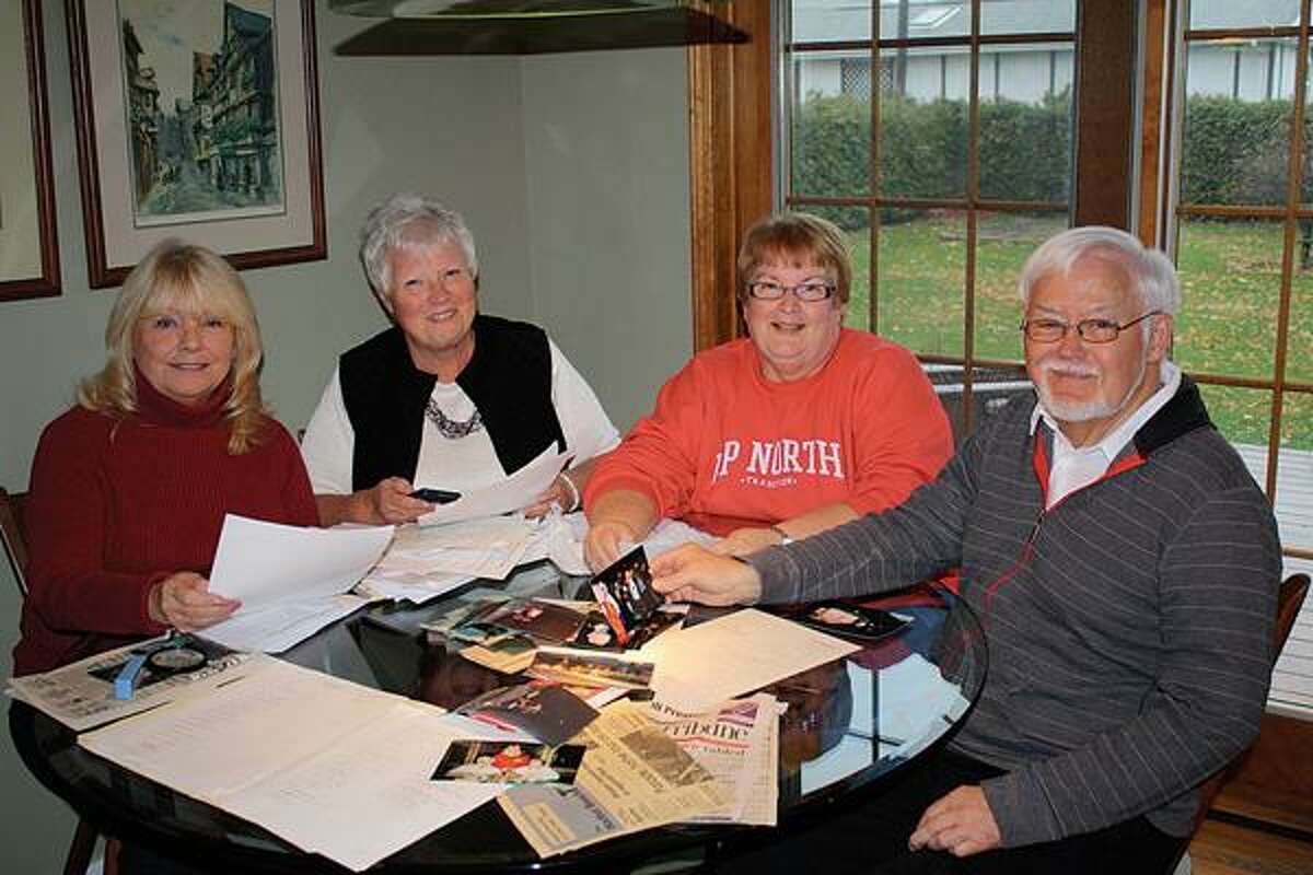 Harbor Beach parade committee members marching to retirement