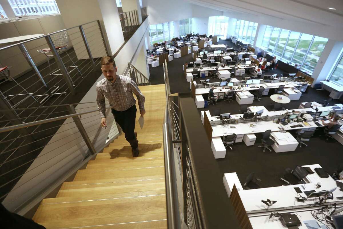 Stairs and showing the open work space at HOK, a global design, architecture, engineering and planning firm, Monday, April 11, 2016, in Houston, Texas. ( Gary Coronado / Houston Chronicle )