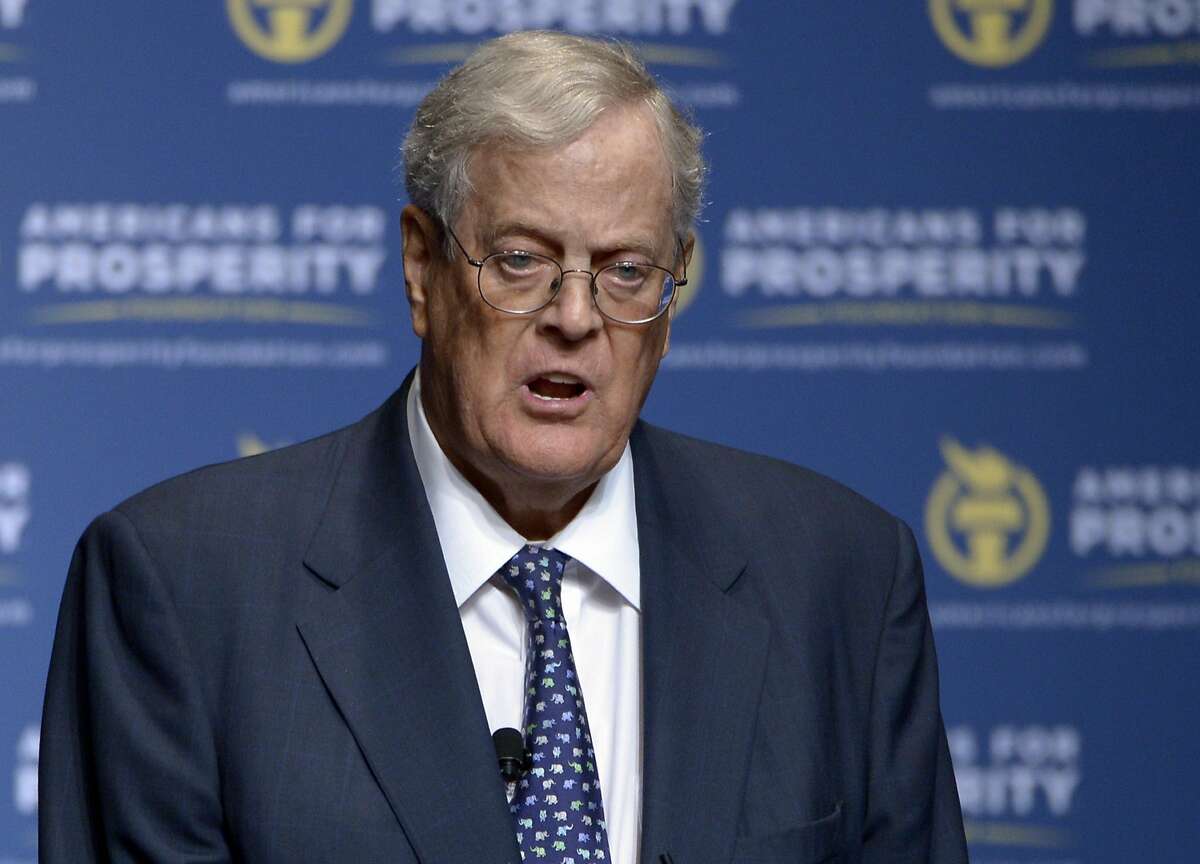 In this Aug. 30, 2013, file photo, David Koch speaks in Orlando, Fla. Republican presidential candidates Carly Fiorina and Wisconsin Gov. Scott Walker are to speak at gathering hosted by the conservative political donors Charles and David Koch. (AP Photo/Phelan M. Ebenhack, File)