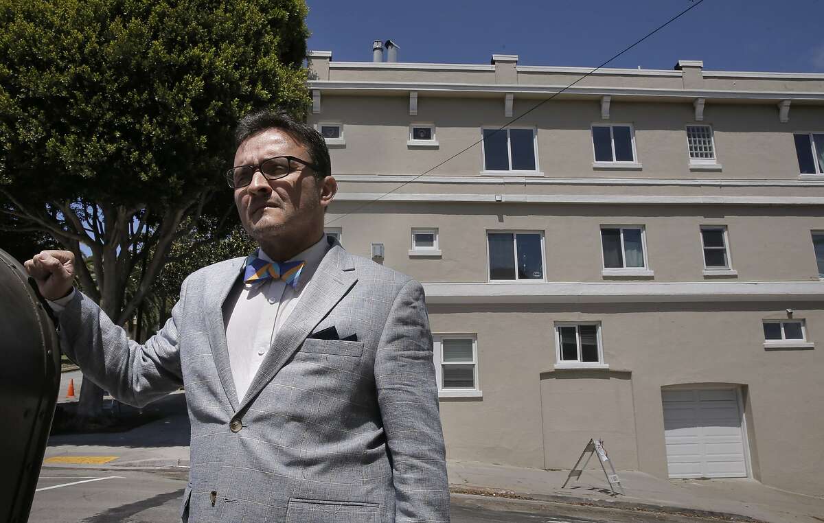 San Francisco Supervisor David Campos on Sat. April 23, 2016, in front of a property at 1297 Dolores in San Francisco, California, that the city says was illegally converted into a tourist hotel. Campos along with Aaron Peskin want to toughen San Francisco's vacation-rental laws to make platforms like Airbnb and HomeAway more responsible to enforce the law.