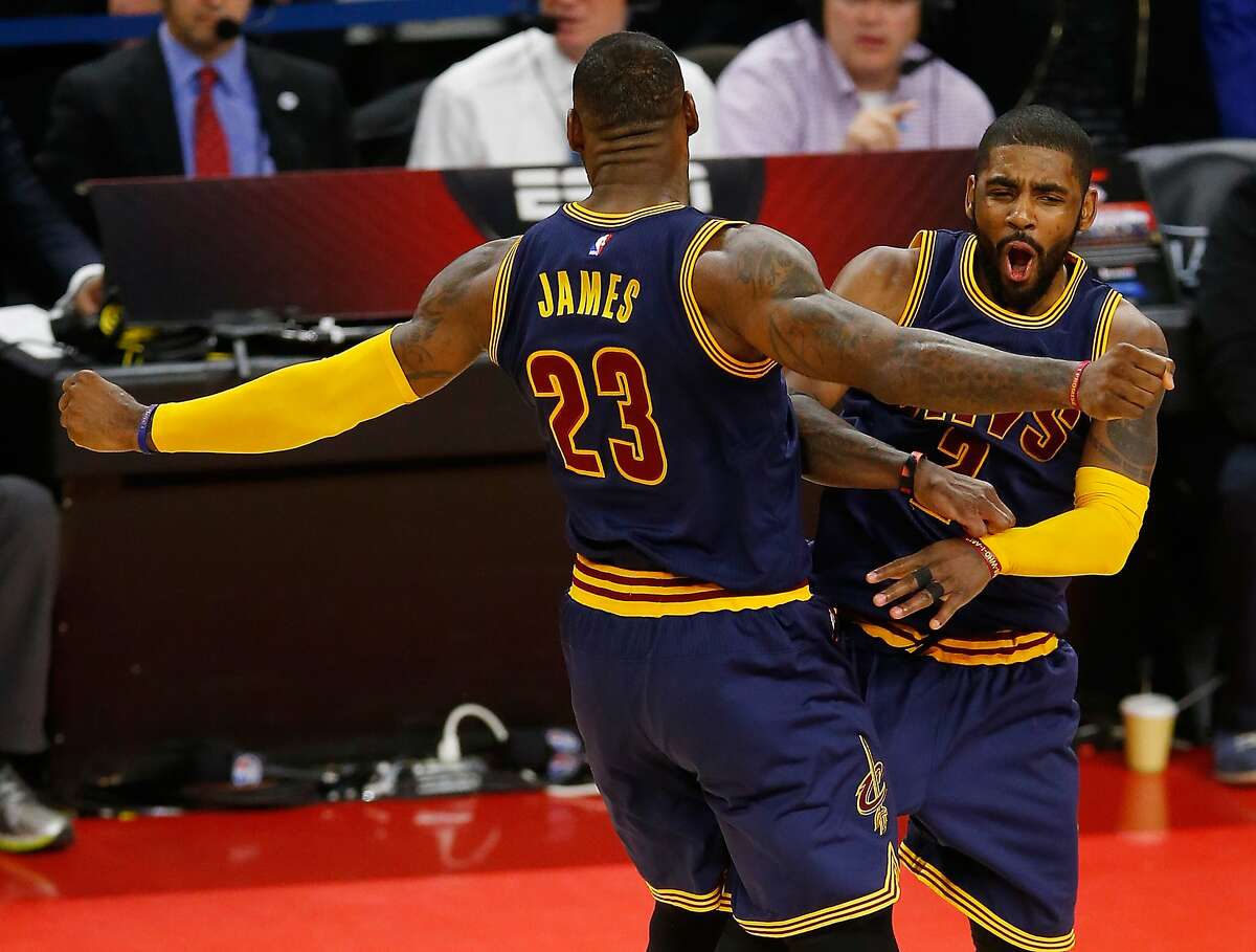 Shaquille O'Neal and LeBron James of the Cleveland Cavaliers pose