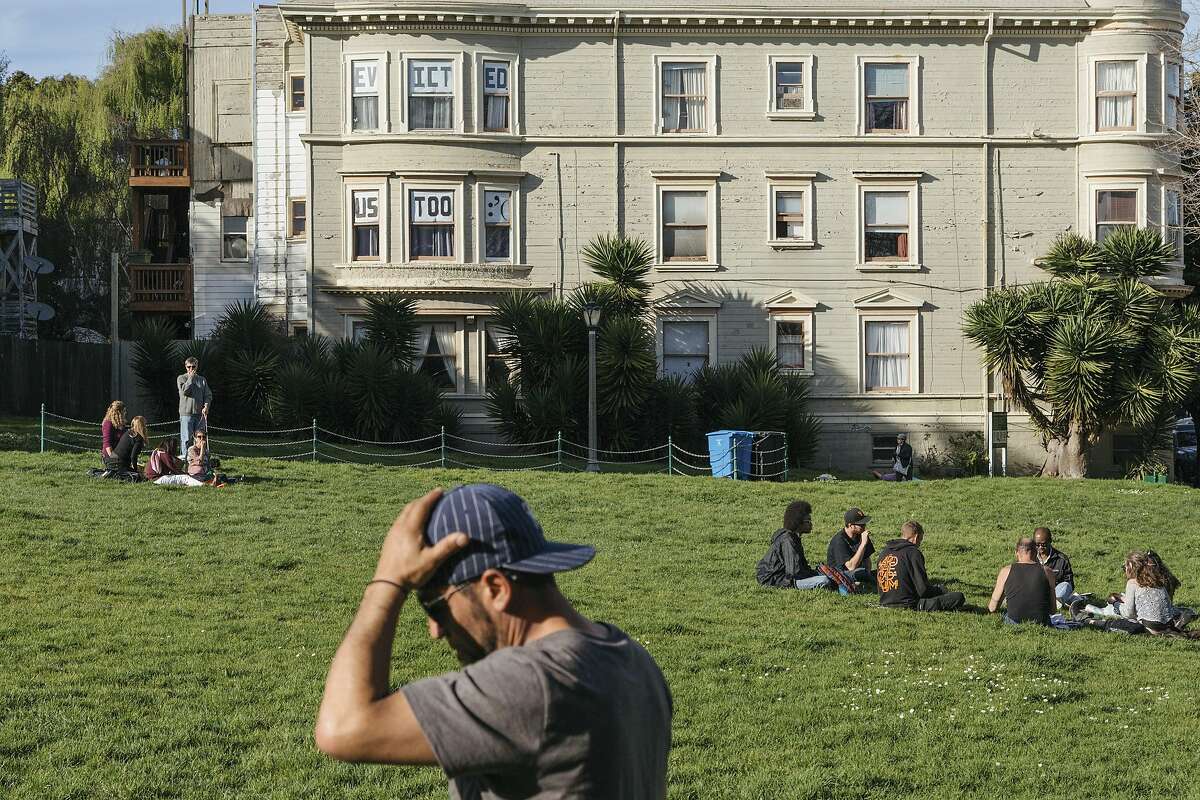 A sign in windows near Duboce Park reads, "evicted us too :�(� in San Francisco, Feb. 22, 2016. The city is bulging, the rents soaring, and residents are growing more vocal about wishing Silicon Valley would cool off, or at least pay up. (Jason Henry/The New York Times)