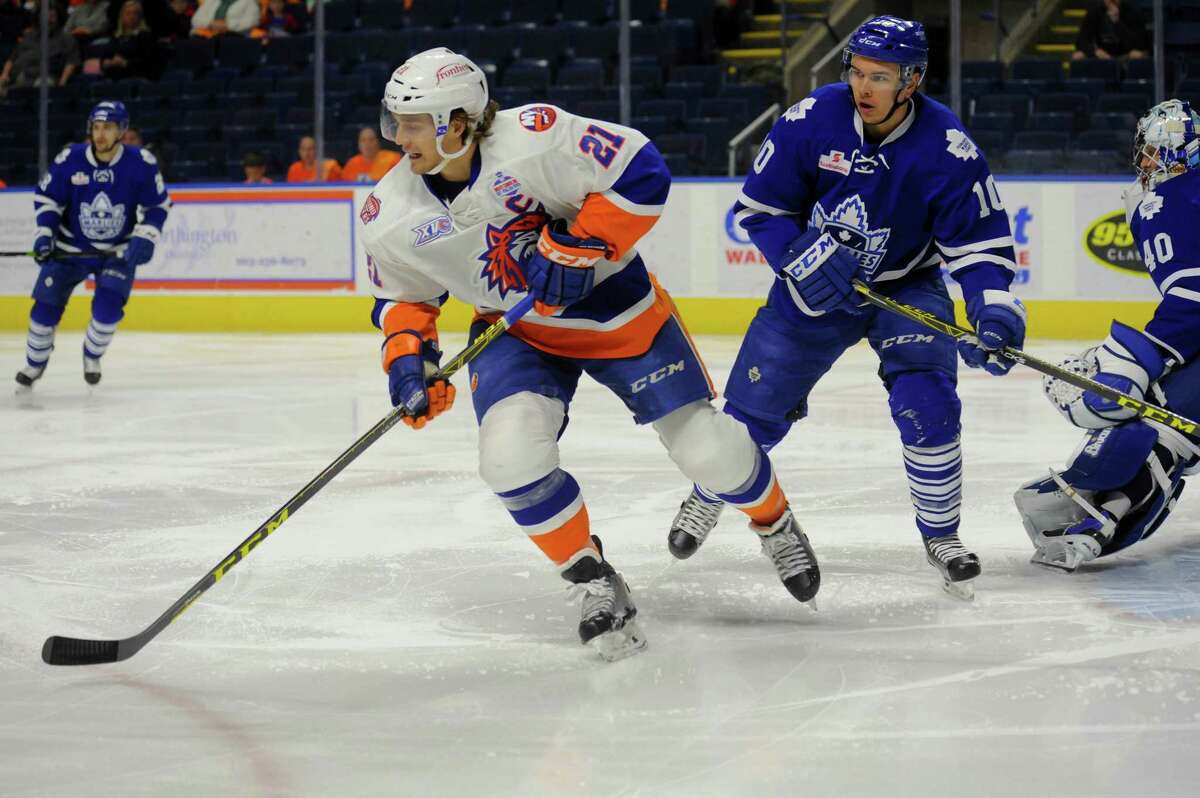 Ben Holmstrom (21) of the Bridgeport Sound Tigers looks to pass during Game 2 of the 2016 Calder Cup Playoffs against the Toronto Marlies at Webster Bank Arena on April 24, 2016 in Bridgeport, Connecticut.