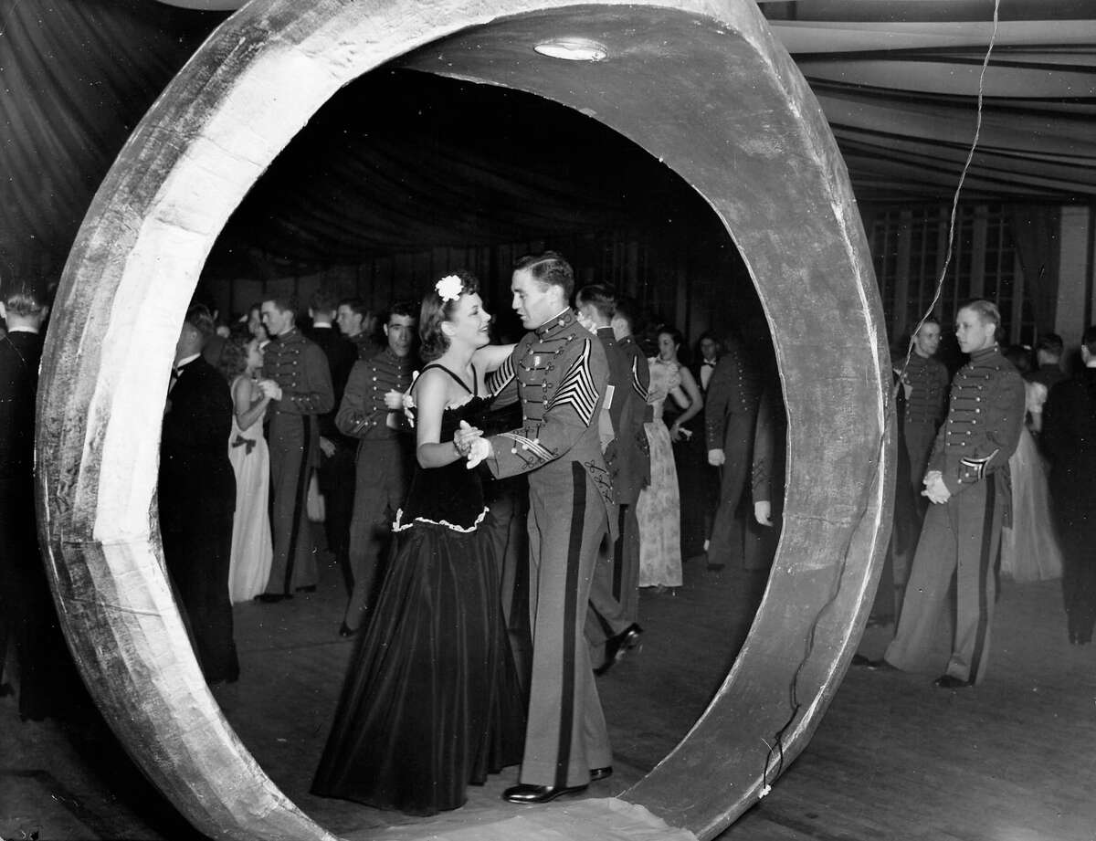 Mary Joyce Walsh (CL) dancing with date at The Citadel's prom.