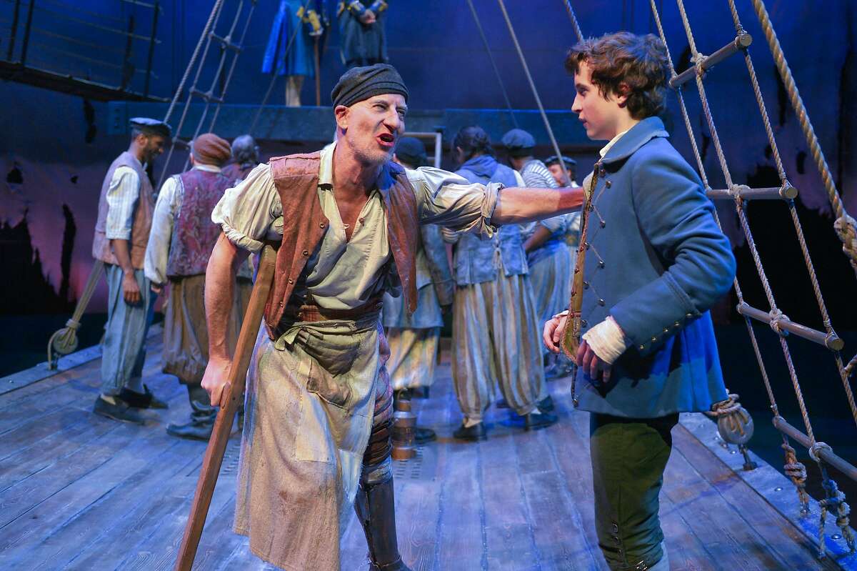 Steven Epp (left) as Long John Silver counsels John Babbo as Jim Hawkins in Mary Zimmerman's adaptation of the Robert Louis Stevenson classic "Treasure Island," a co-production of Berkeley Repertory Theatre and Chicago's Lookingglass Theatre Company. The show runs through June 5 at the Peet's Theatre. Photo by Kevin Berne/Berkeley Repertory Theatre