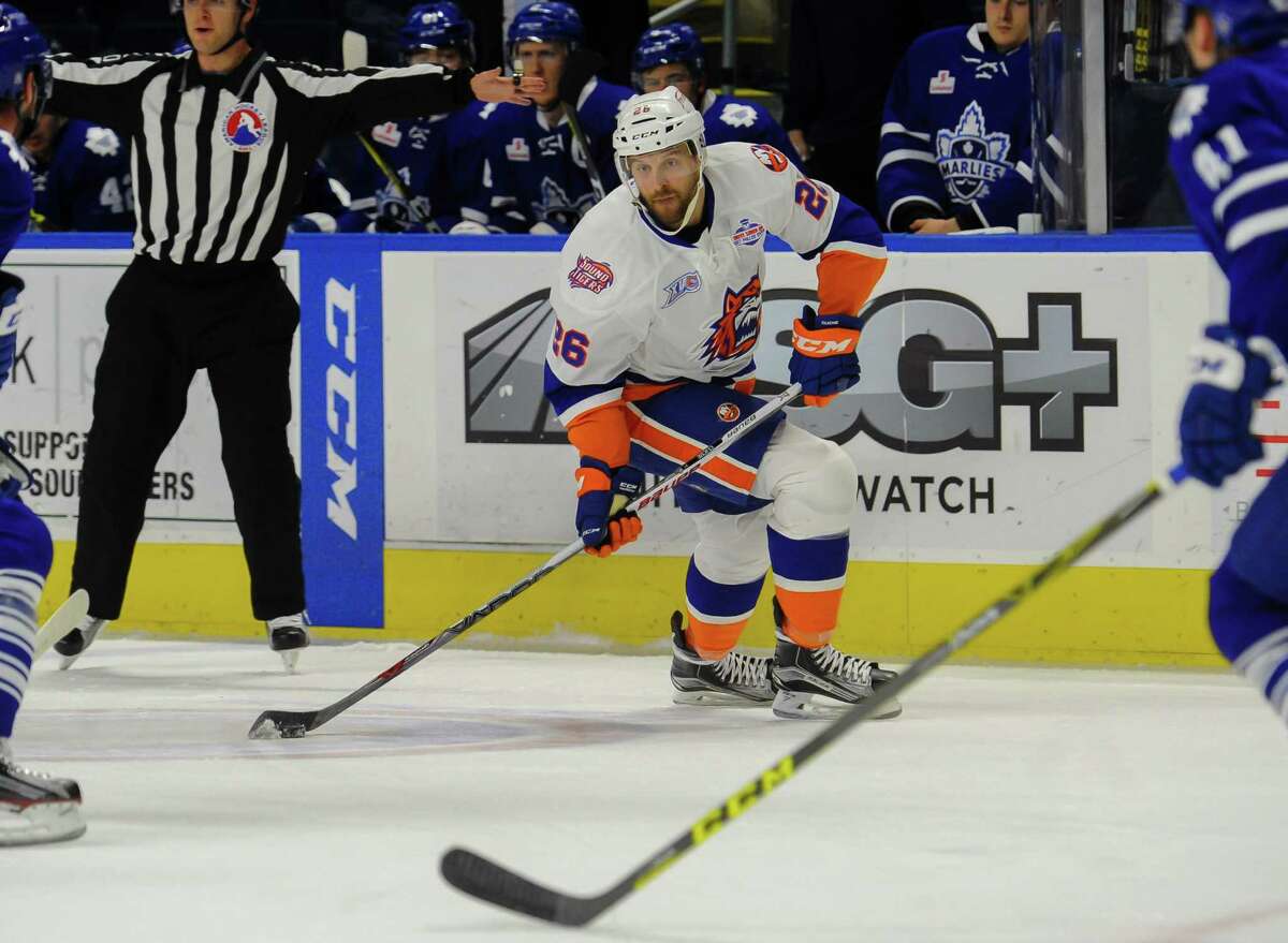 Marc-Andre Cliche (26) of the Bridgeport Sound Tigers looks to pass during Game 2 of the 2016 Calder Cup Playoffs against the Toronto Marlies at Webster Bank Arena on April 24, 2016 in Bridgeport, Connecticut.